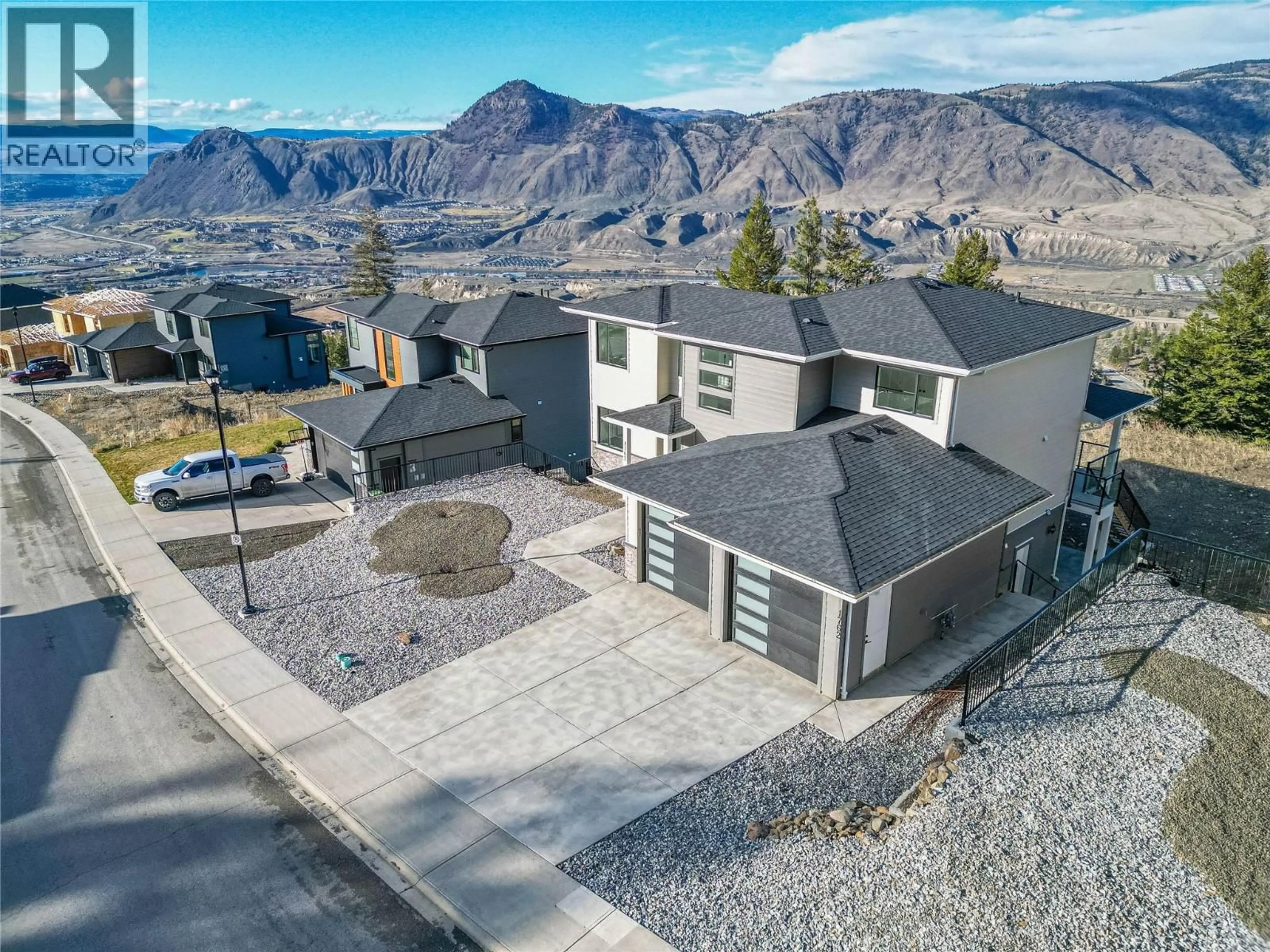 A pic from outside/outdoor area/front of a property/back of a property/a pic from drone, mountain view for 1762 BALSAM PLACE, Kamloops British Columbia V2E0E2