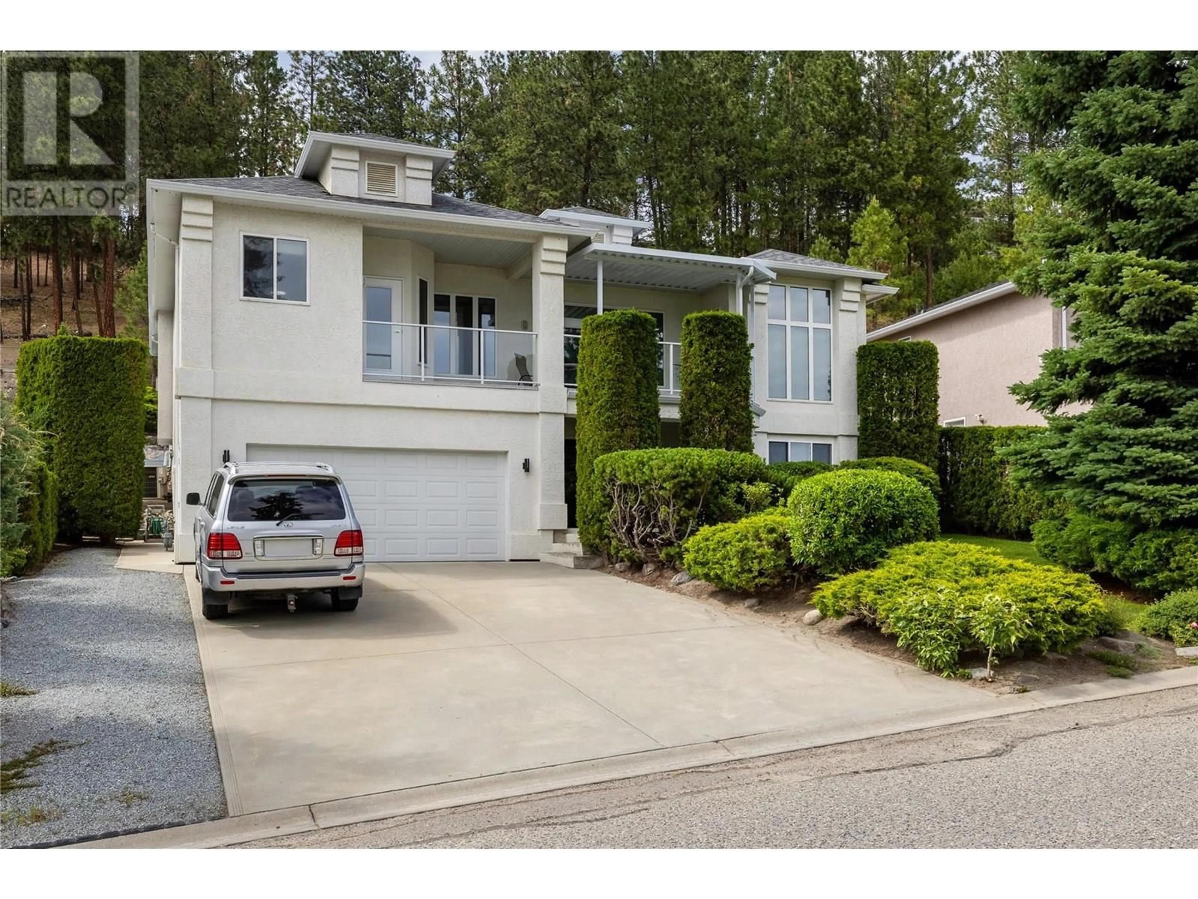 Home with vinyl exterior material, street for 1116 CALEDONIA WAY, West Kelowna British Columbia V1Z3N7