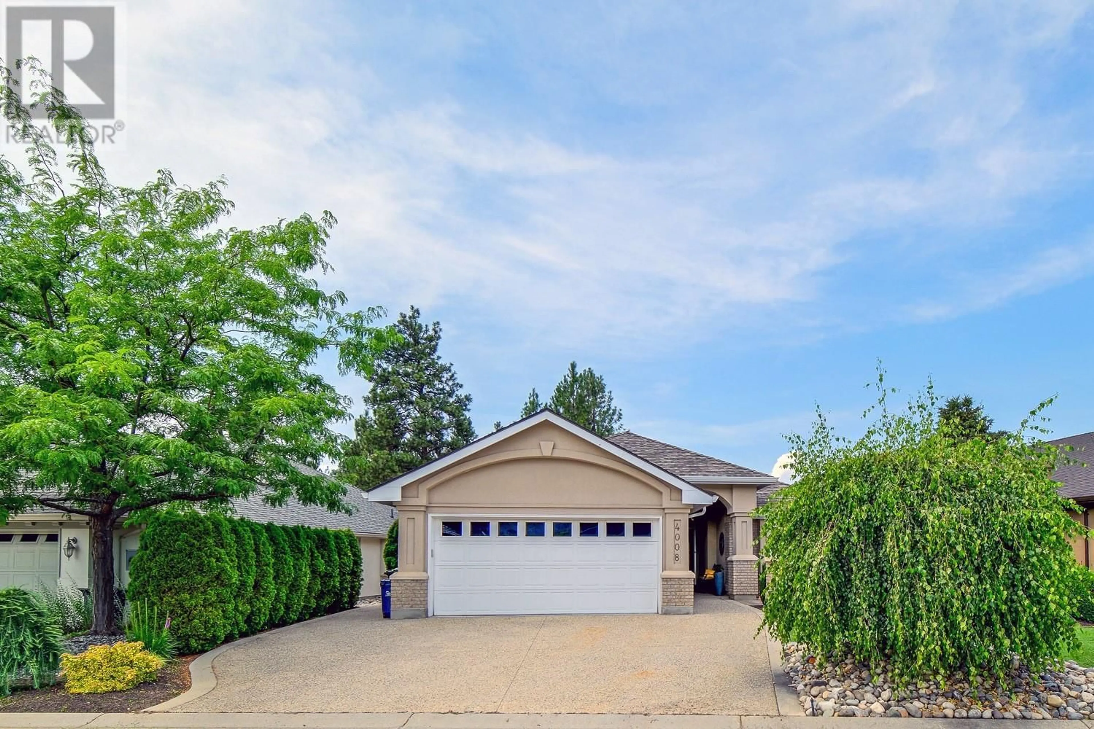 Home with vinyl exterior material, street for 4008 GALLAGHERS TERRACE, Kelowna British Columbia V1W3Z8