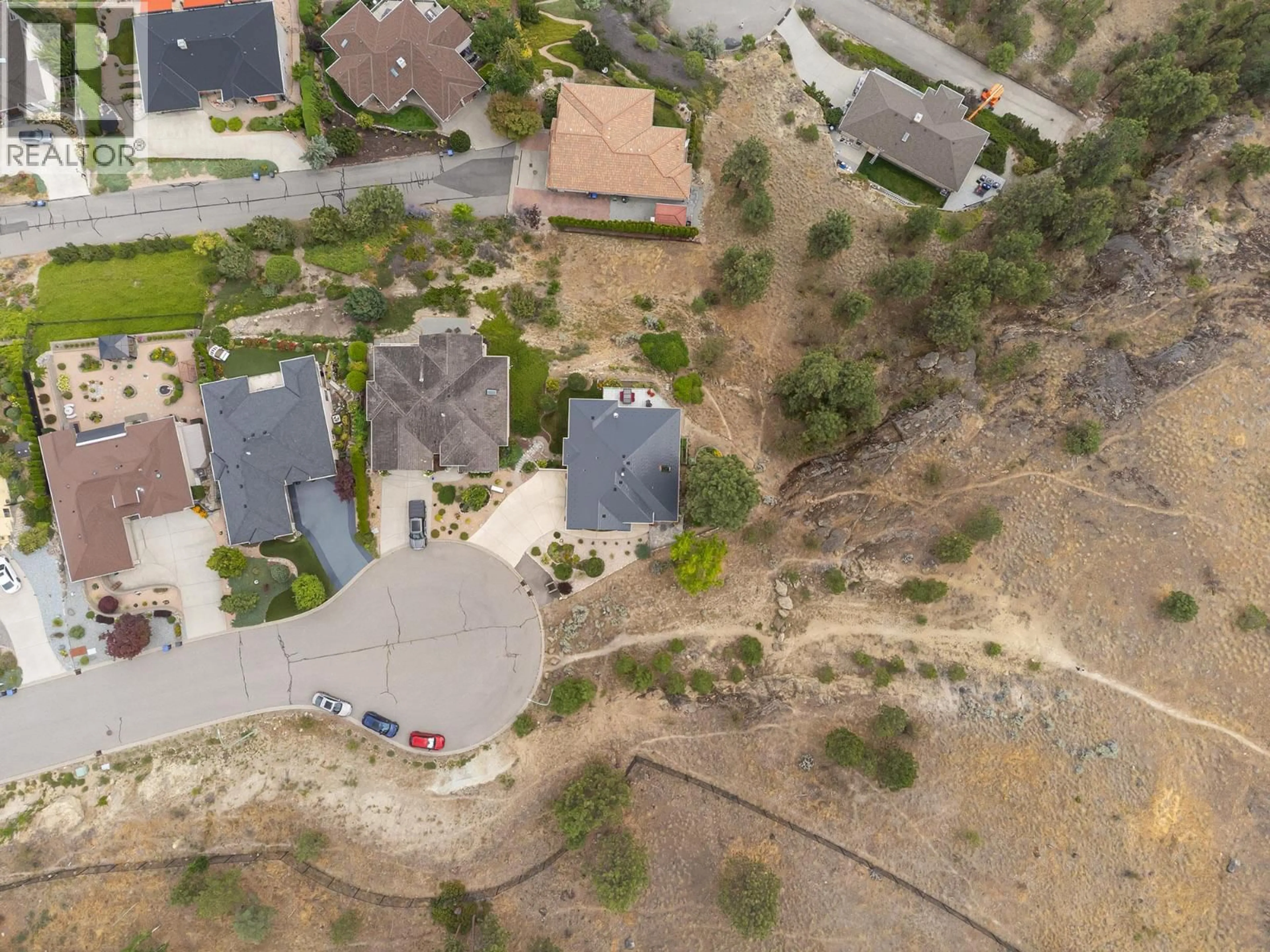 A pic from outside/outdoor area/front of a property/back of a property/a pic from drone, street for 3659 GALA VIEW DRIVE, West Kelowna British Columbia V4T2M3