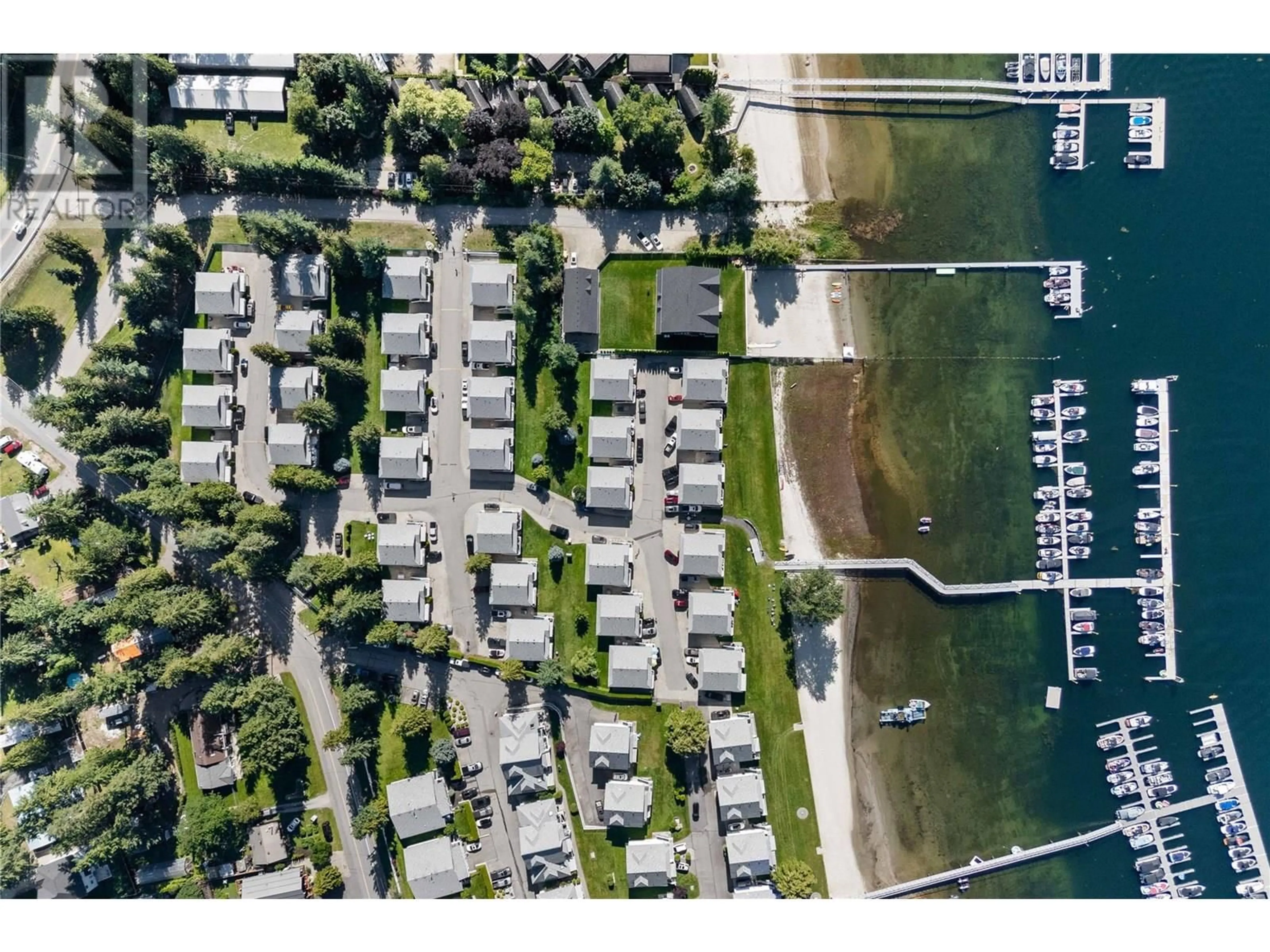 A pic from outside/outdoor area/front of a property/back of a property/a pic from drone, street for 46 - 505 POAGE AVENUE, Sicamous British Columbia V0E2V1