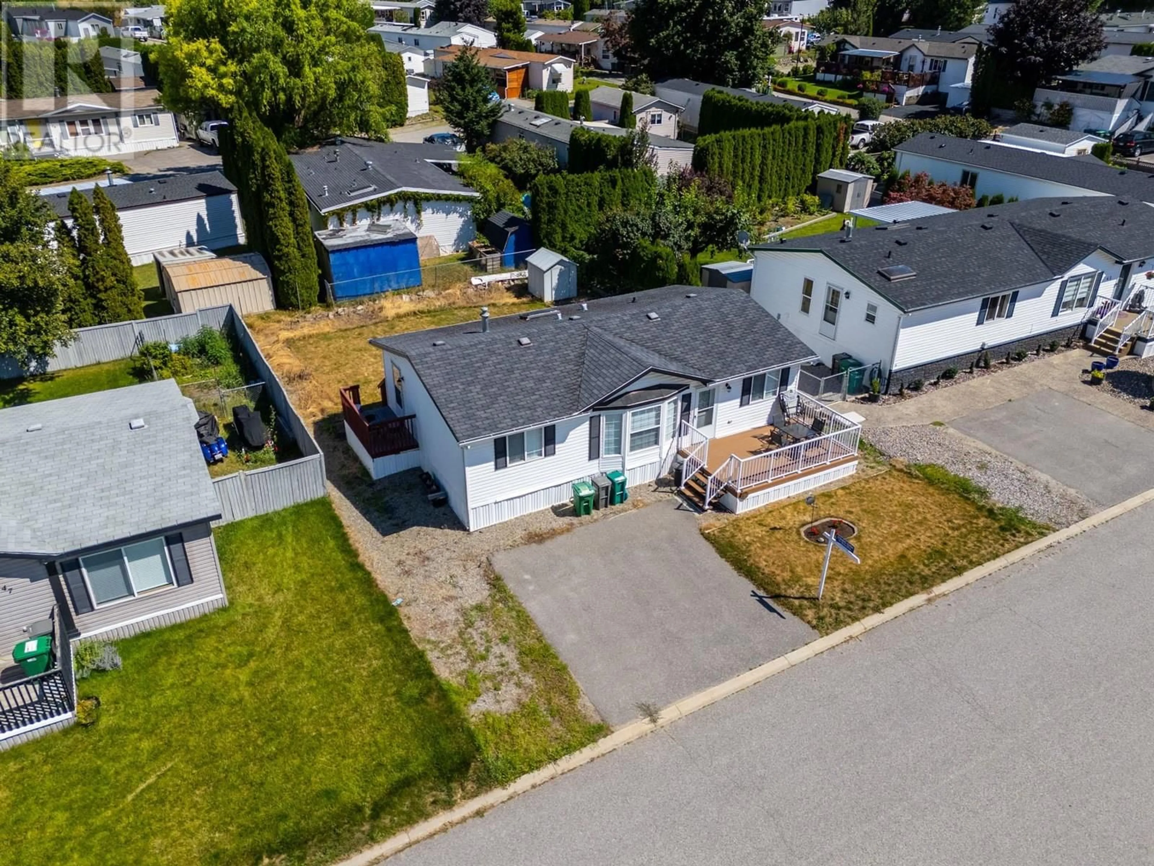A pic from outside/outdoor area/front of a property/back of a property/a pic from drone, street for 46 - 610 KATHERINE ROAD, Kelowna British Columbia V1Z3G2