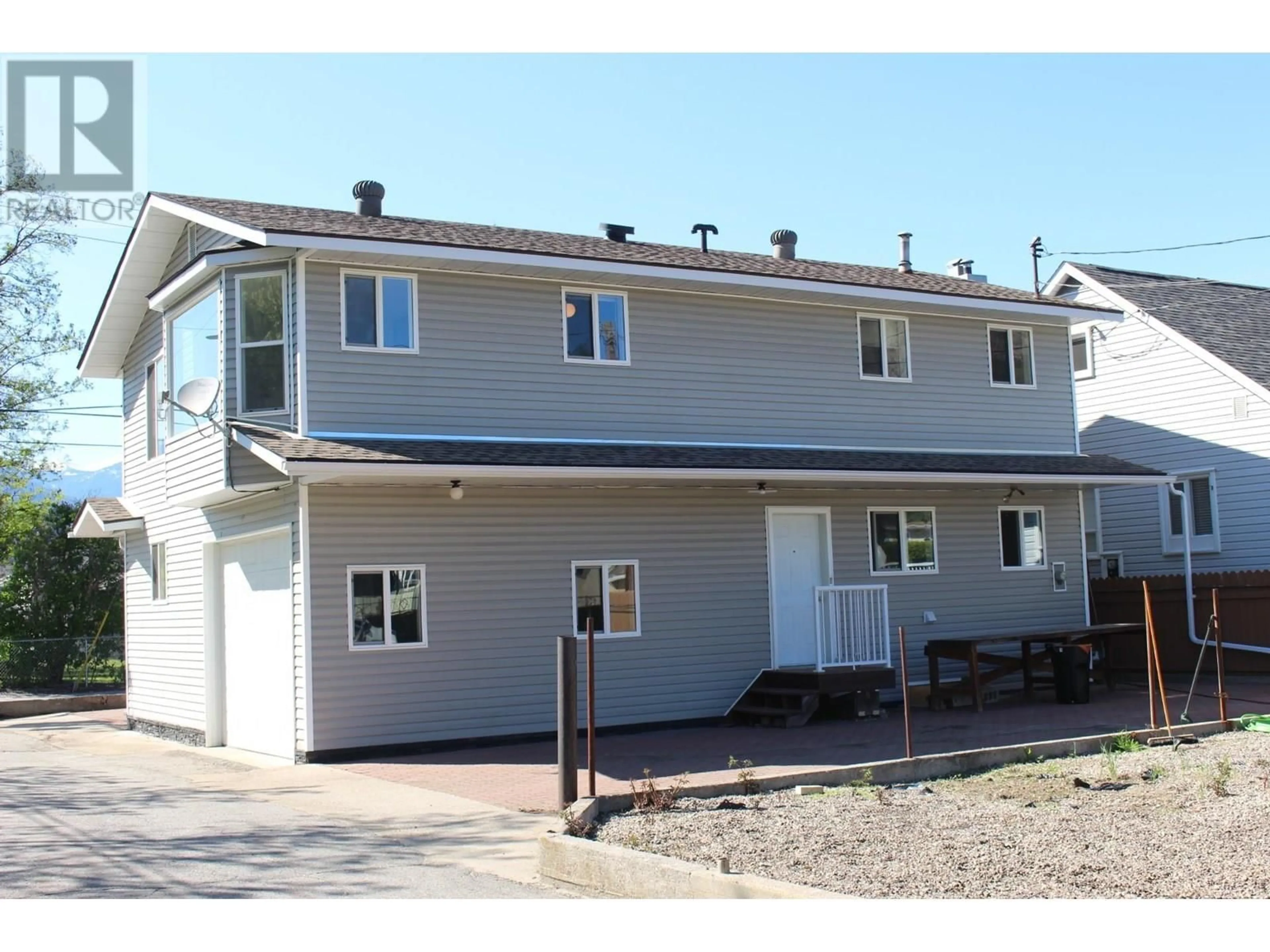 Home with vinyl exterior material, building for 1610 MCBRIDE STREET, Trail British Columbia V1R2Z6
