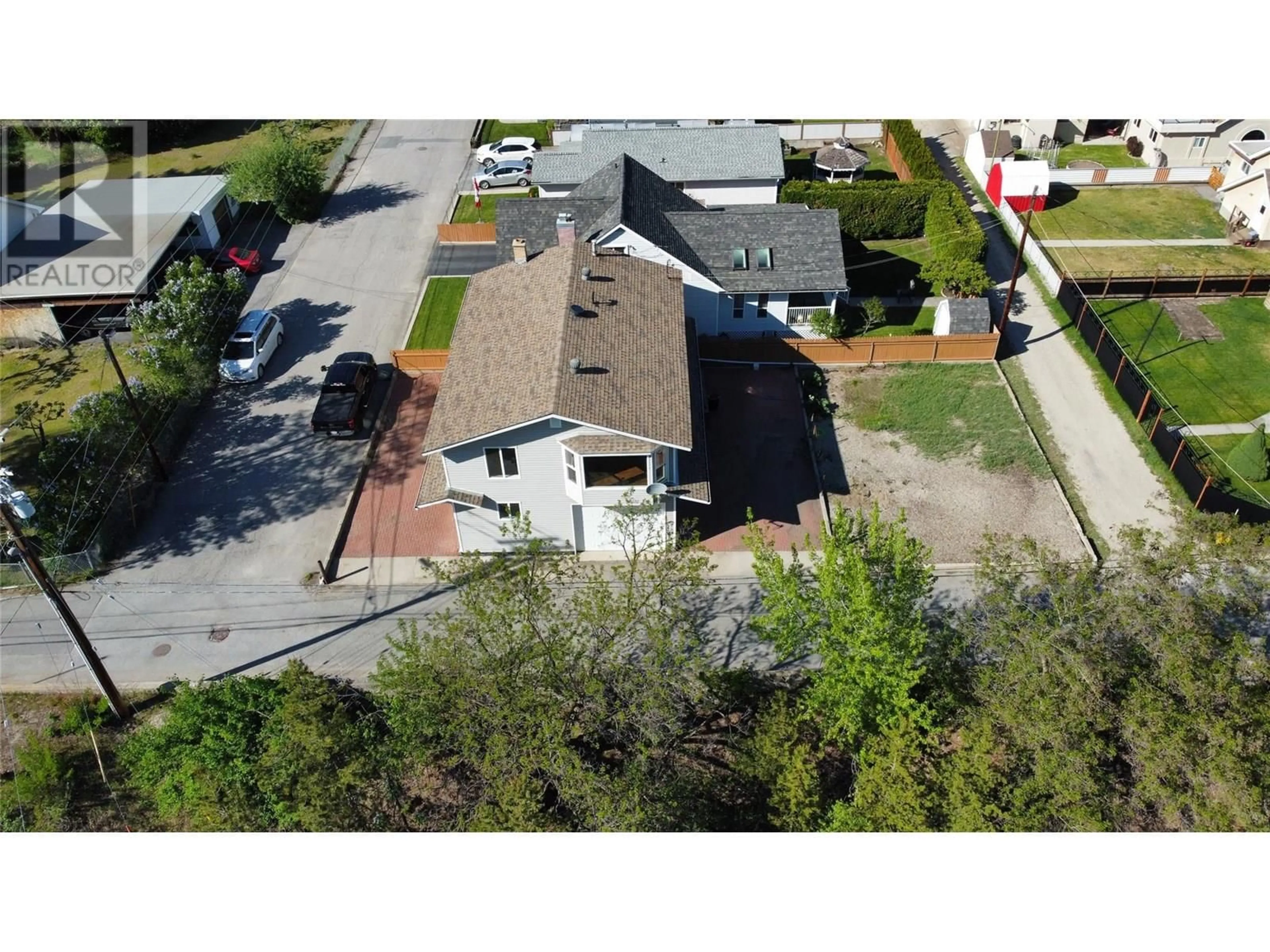 A pic from outside/outdoor area/front of a property/back of a property/a pic from drone, street for 1610 MCBRIDE STREET, Trail British Columbia V1R2Z6