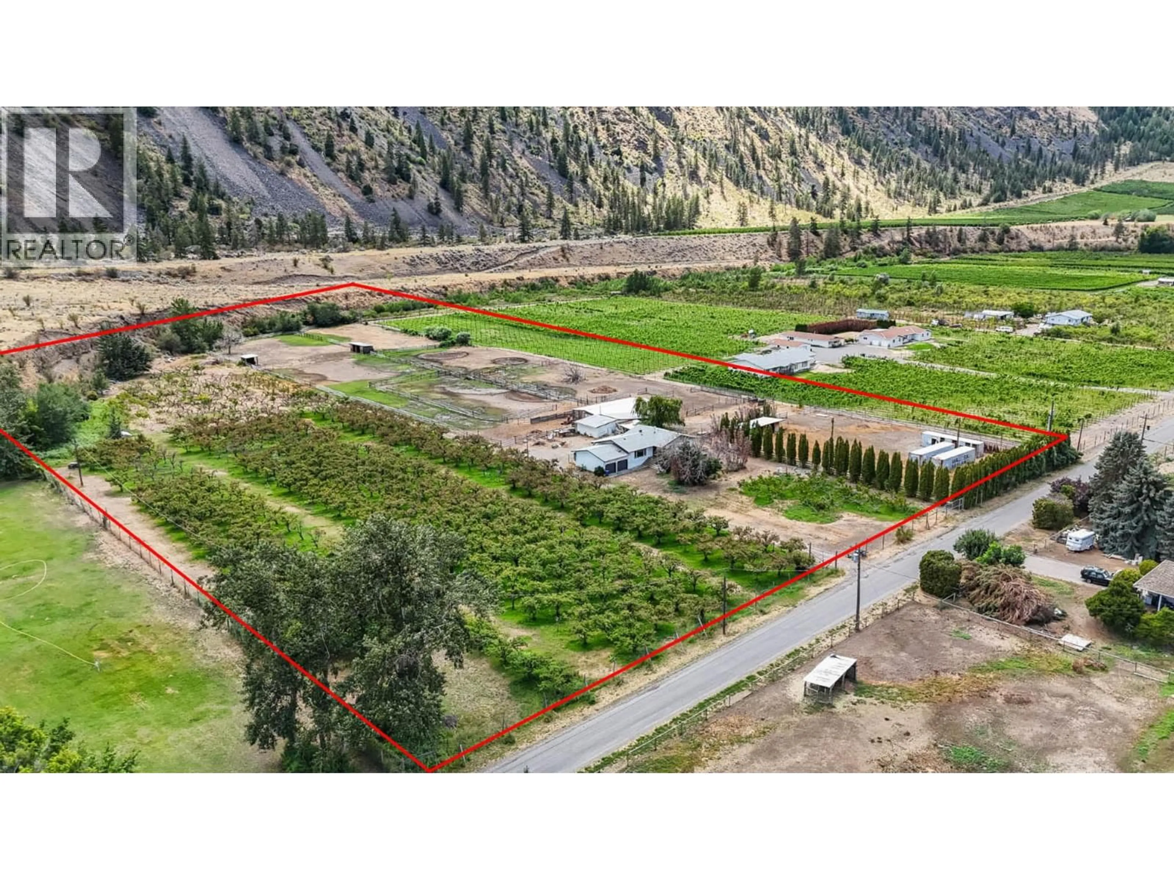 A pic from outside/outdoor area/front of a property/back of a property/a pic from drone, mountain view for 3219 RIVER ROAD, Keremeos British Columbia V0X1N1