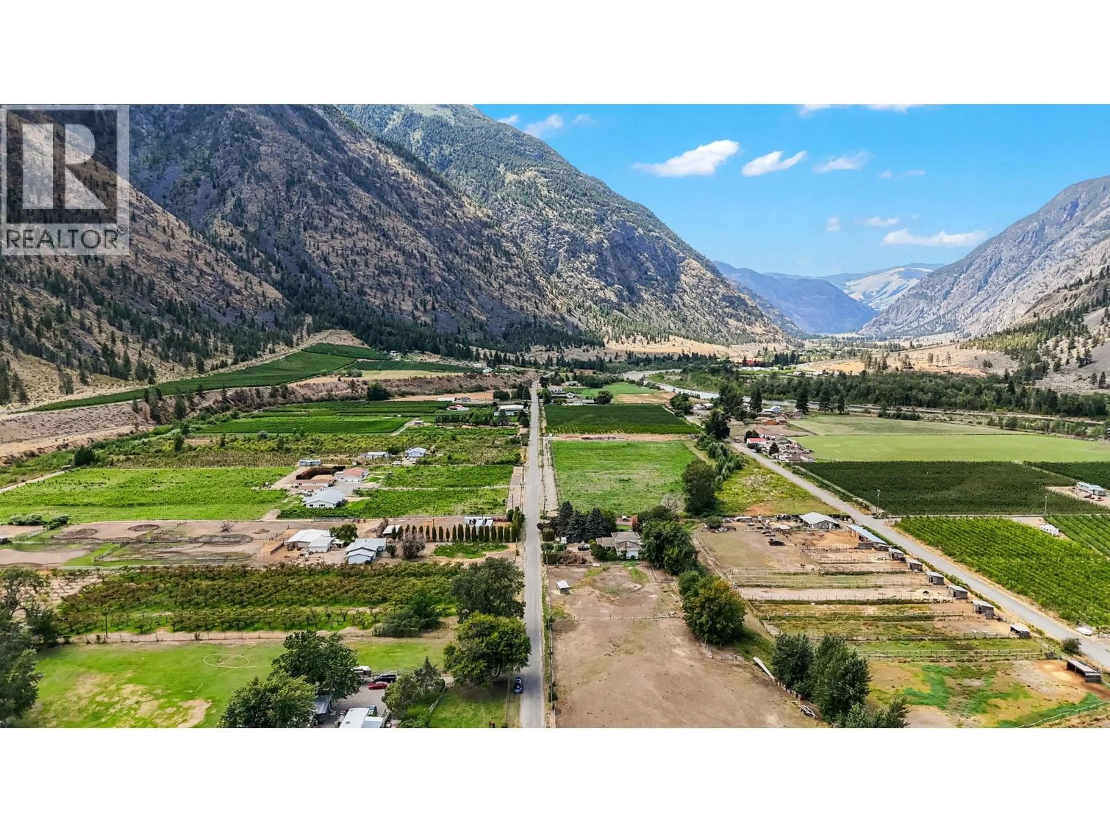 A pic from outside/outdoor area/front of a property/back of a property/a pic from drone, mountain view for 3219 RIVER ROAD, Keremeos British Columbia V0X1N1