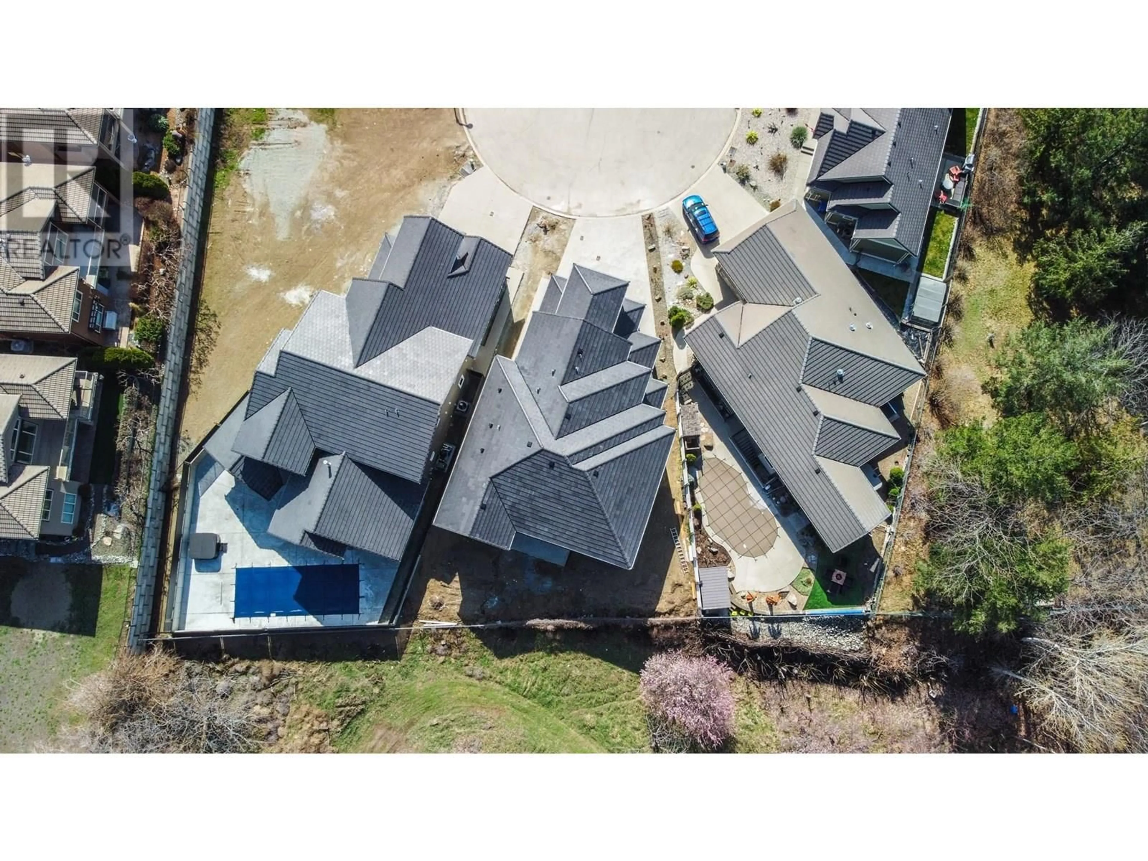 A pic from outside/outdoor area/front of a property/back of a property/a pic from drone, street for 18 CHARDONNAY COURT, Osoyoos British Columbia V0H1V6