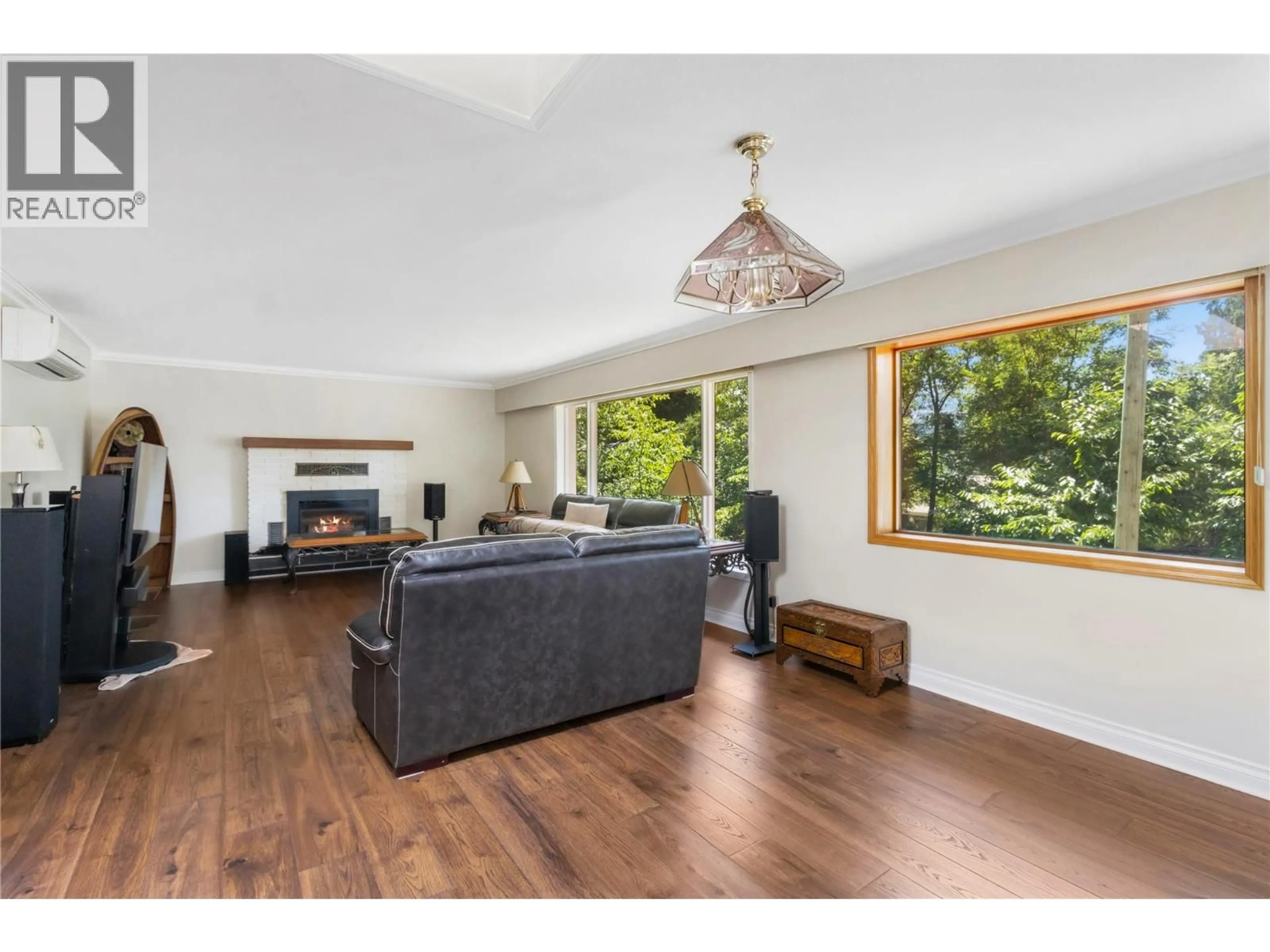 Living room with furniture, wood/laminate floor for 2066 EAGLE BAY ROAD, Blind Bay British Columbia V0E1H1