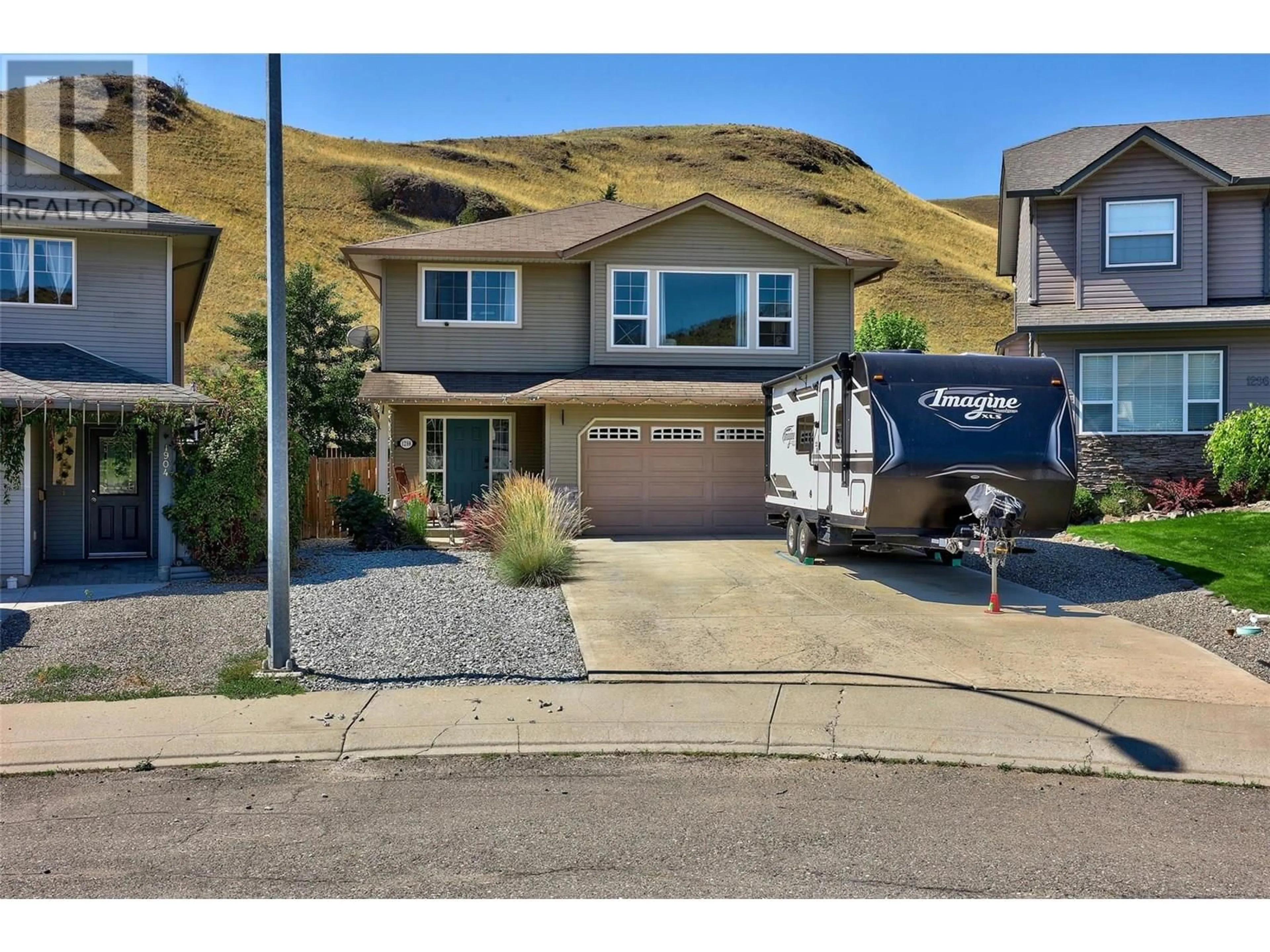 Home with vinyl exterior material, street for 1298 RAVEN DRIVE, Kamloops British Columbia V2B8P4