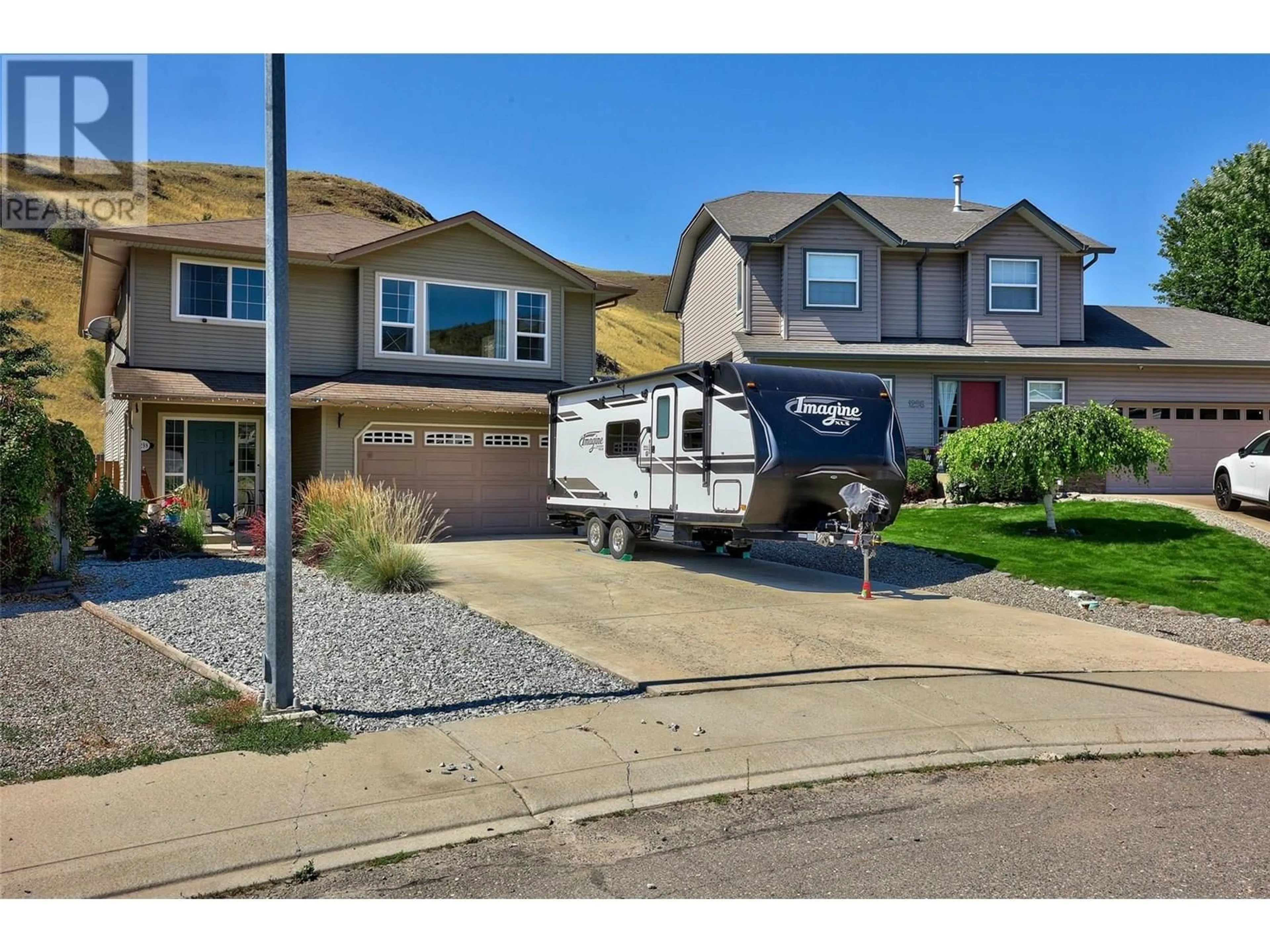 Home with vinyl exterior material, street for 1298 RAVEN DRIVE, Kamloops British Columbia V2B8P4