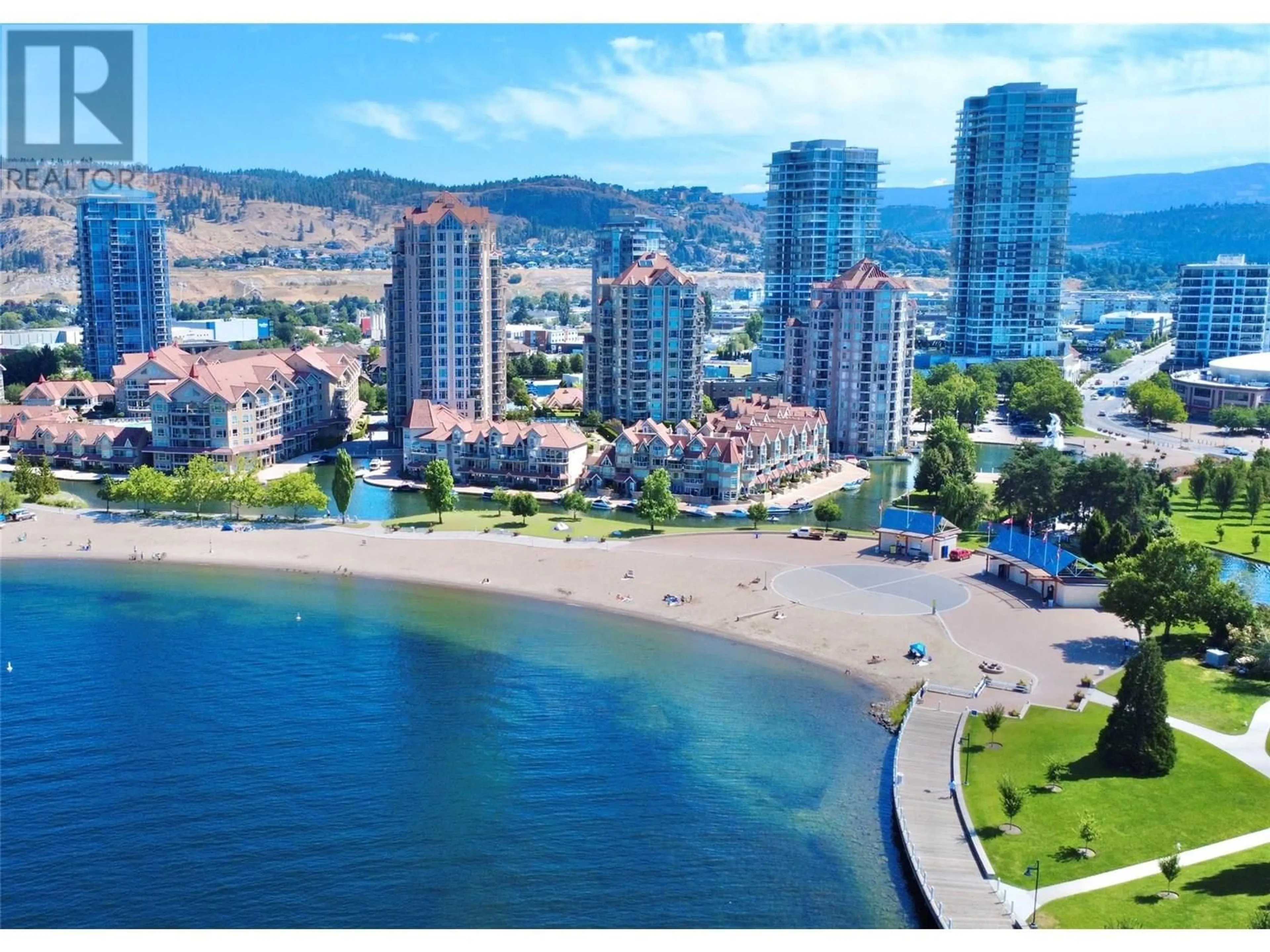 A pic from outside/outdoor area/front of a property/back of a property/a pic from drone, water/lake/river/ocean view for 115 - 1156 SUNSET DRIVE, Kelowna British Columbia V1Y9R7