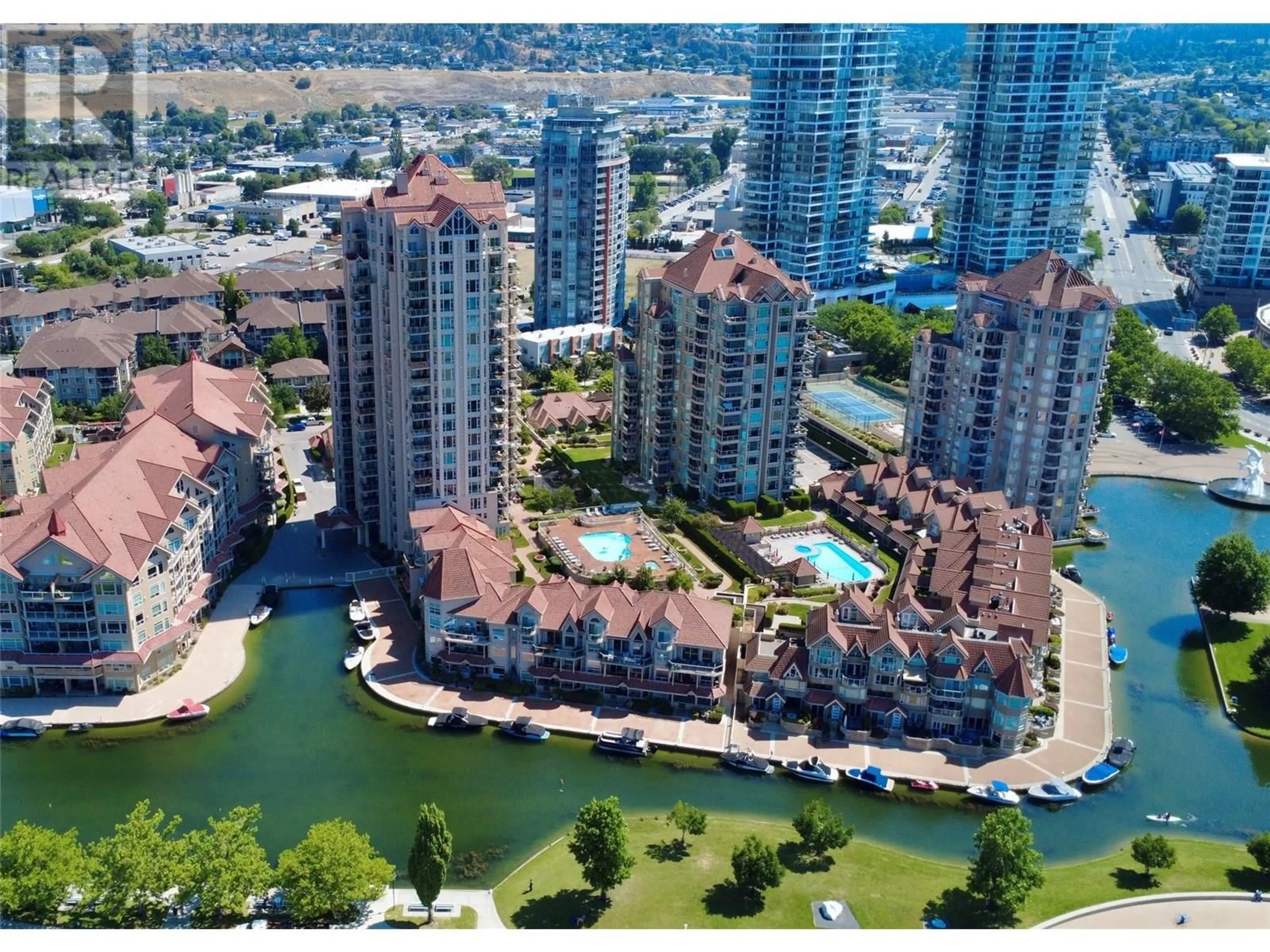 A pic from outside/outdoor area/front of a property/back of a property/a pic from drone, city buildings view from balcony for 115 - 1156 SUNSET DRIVE, Kelowna British Columbia V1Y9R7