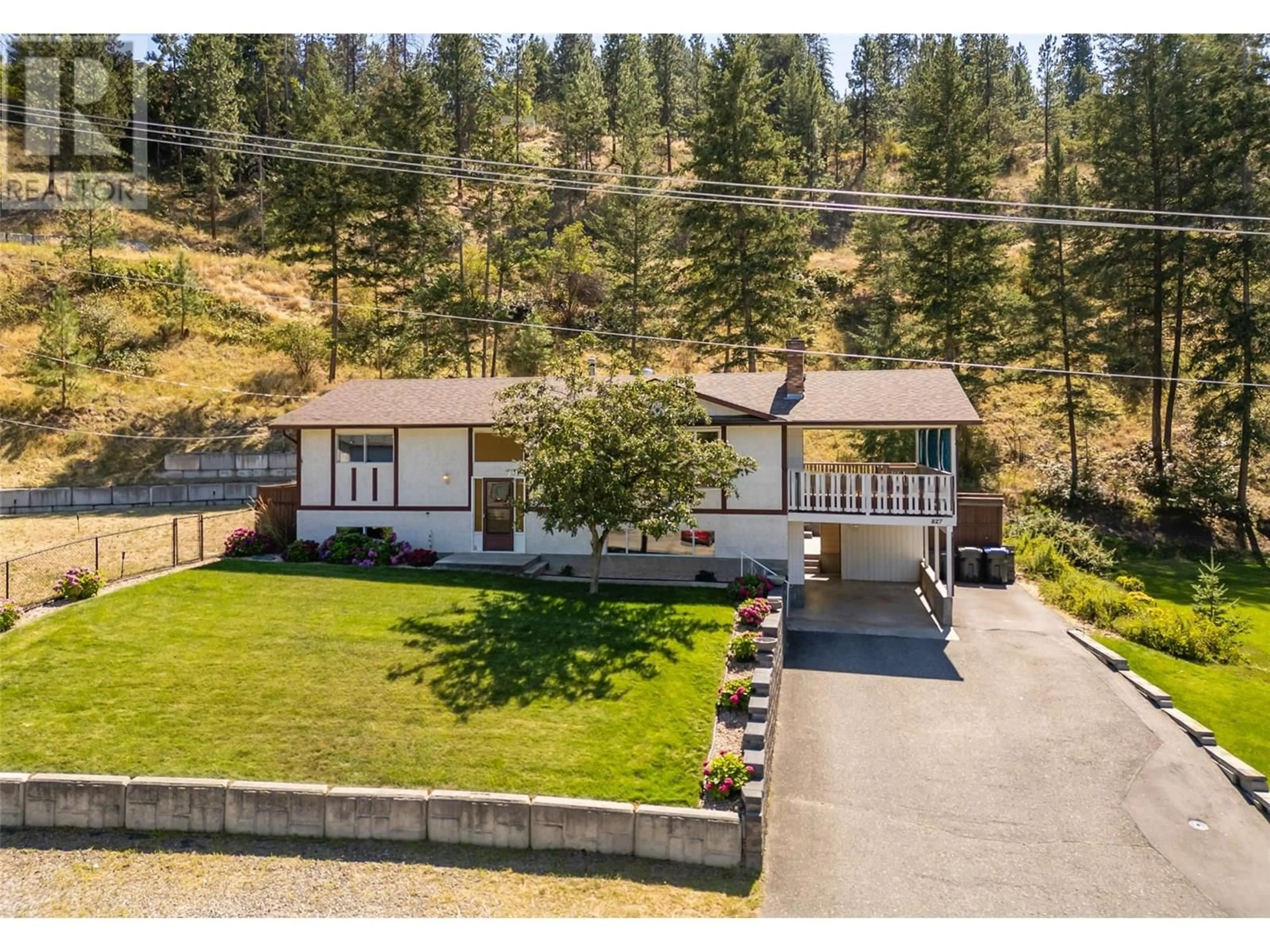 A pic from outside/outdoor area/front of a property/back of a property/a pic from drone, mountain view for 827 PARET ROAD, Kelowna British Columbia V1W4P2
