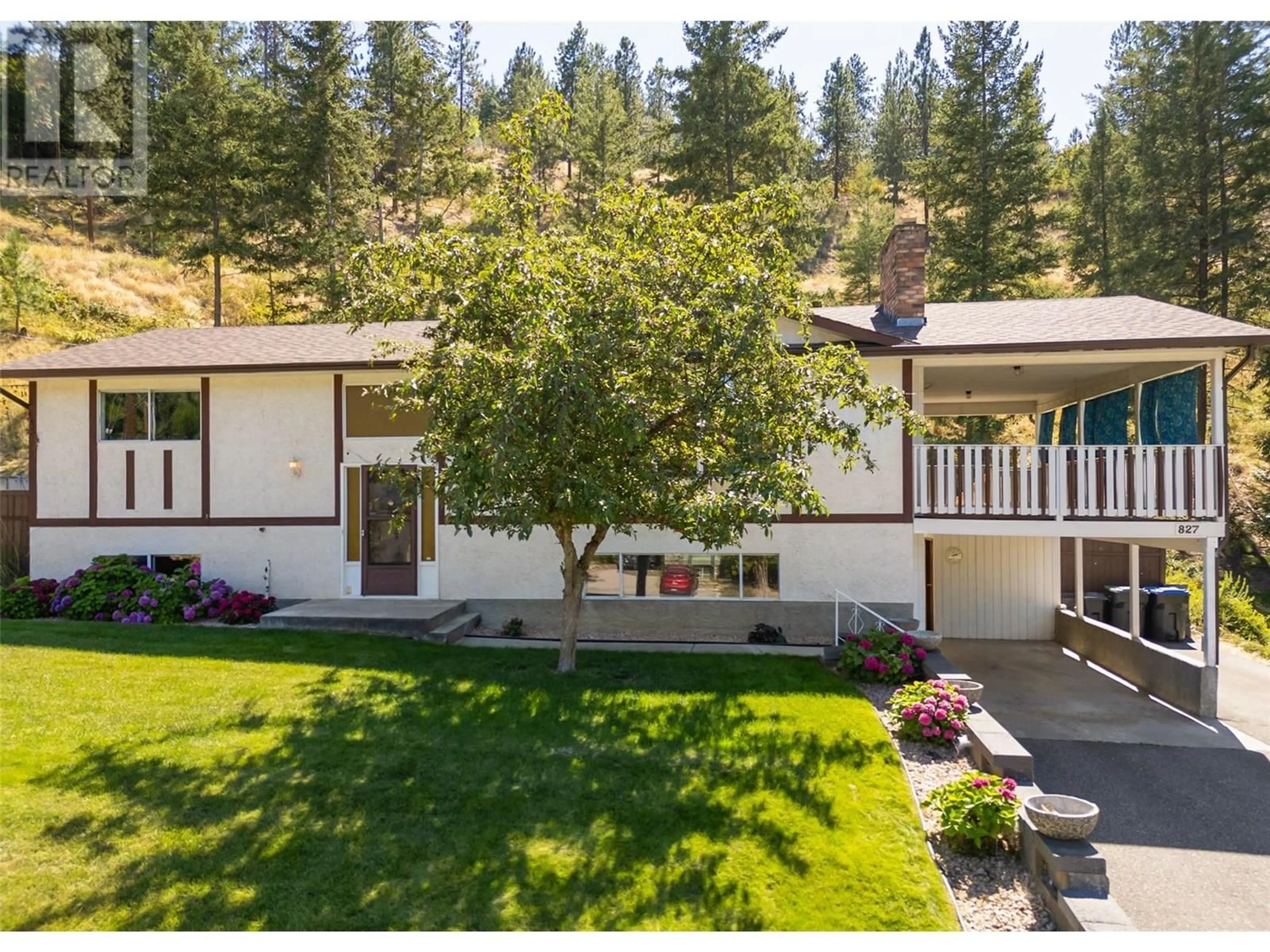Home with vinyl exterior material, mountain view for 827 PARET ROAD, Kelowna British Columbia V1W4P2