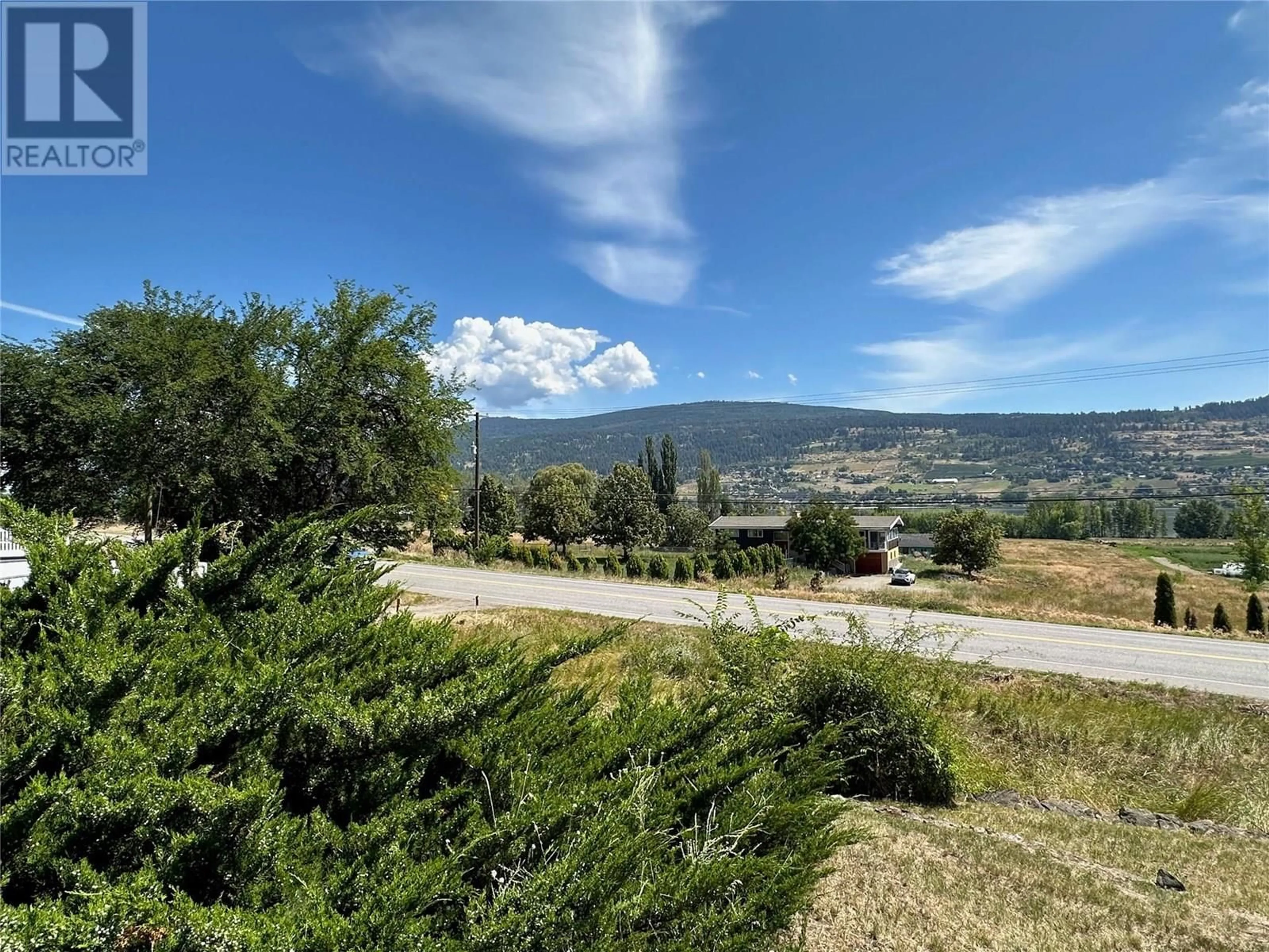 A pic from outside/outdoor area/front of a property/back of a property/a pic from drone, mountain view for 7790 OLD KAMLOOPS ROAD, Vernon British Columbia V1H1W8