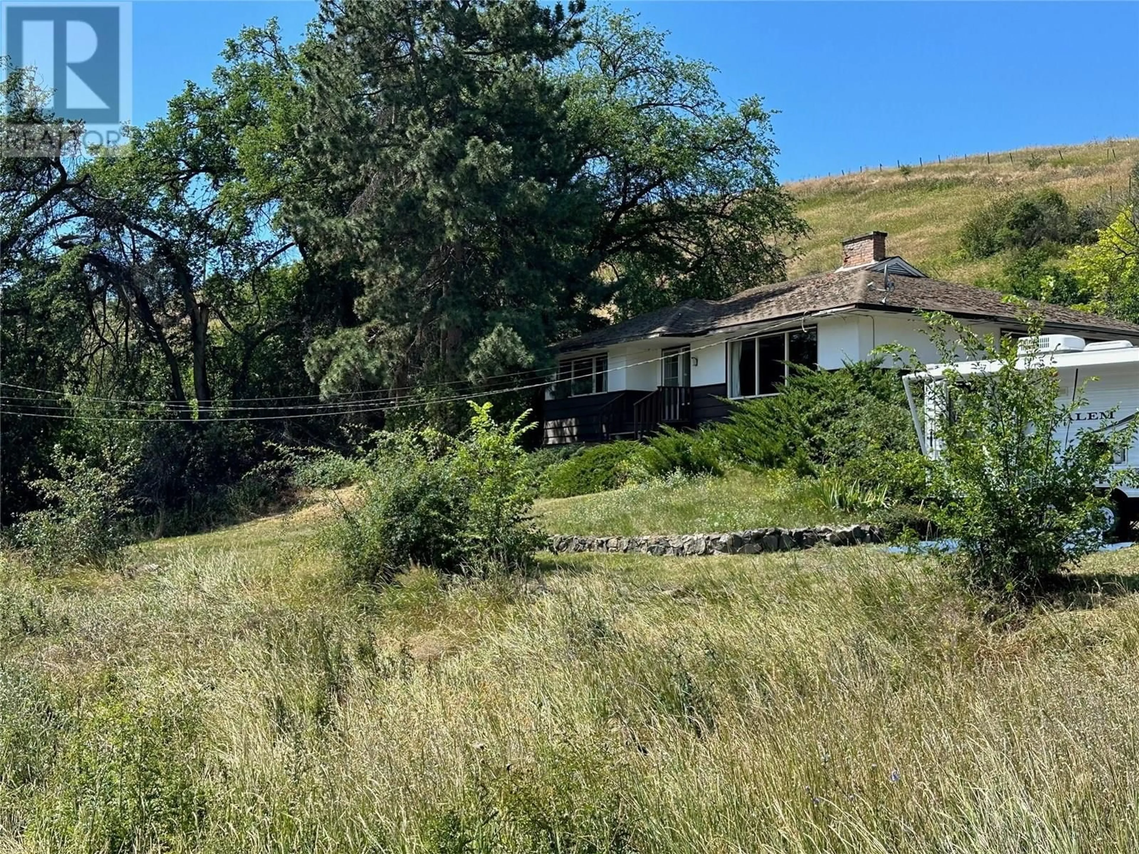 A pic from outside/outdoor area/front of a property/back of a property/a pic from drone, mountain view for 7790 OLD KAMLOOPS ROAD, Vernon British Columbia V1H1W8