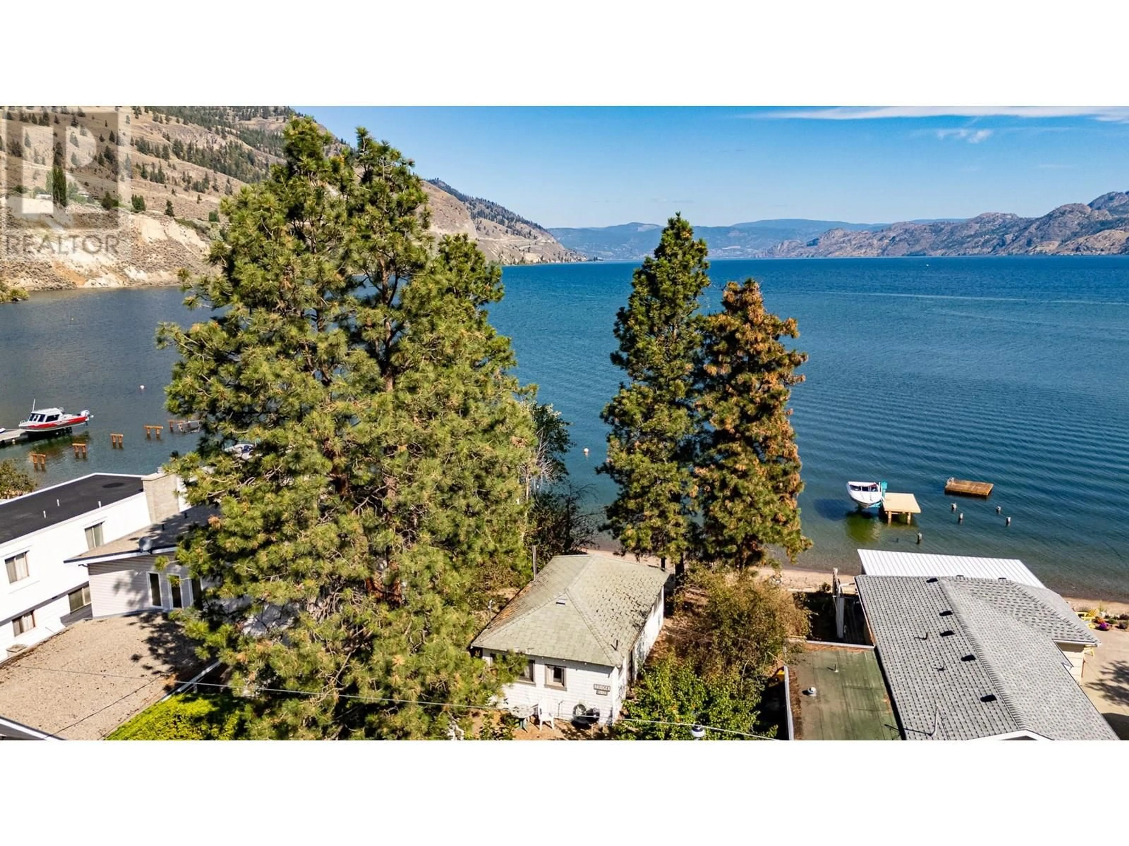 A pic from outside/outdoor area/front of a property/back of a property/a pic from drone, water/lake/river/ocean view for 19241 LAKESHORE DRIVE NORTH, Summerland British Columbia V0H1Z6