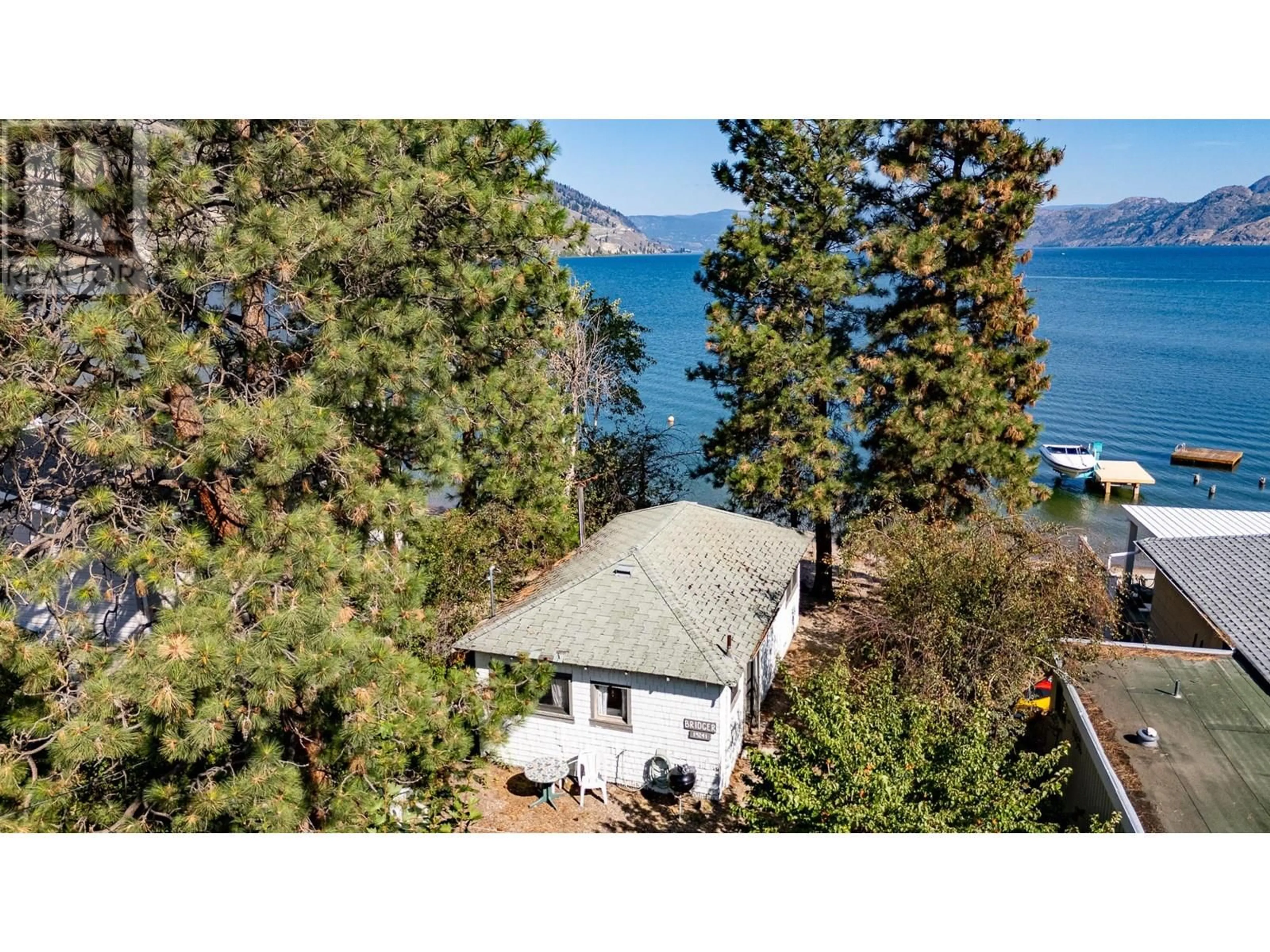 A pic from outside/outdoor area/front of a property/back of a property/a pic from drone, water/lake/river/ocean view for 19241 LAKESHORE DRIVE NORTH, Summerland British Columbia V0H1Z6