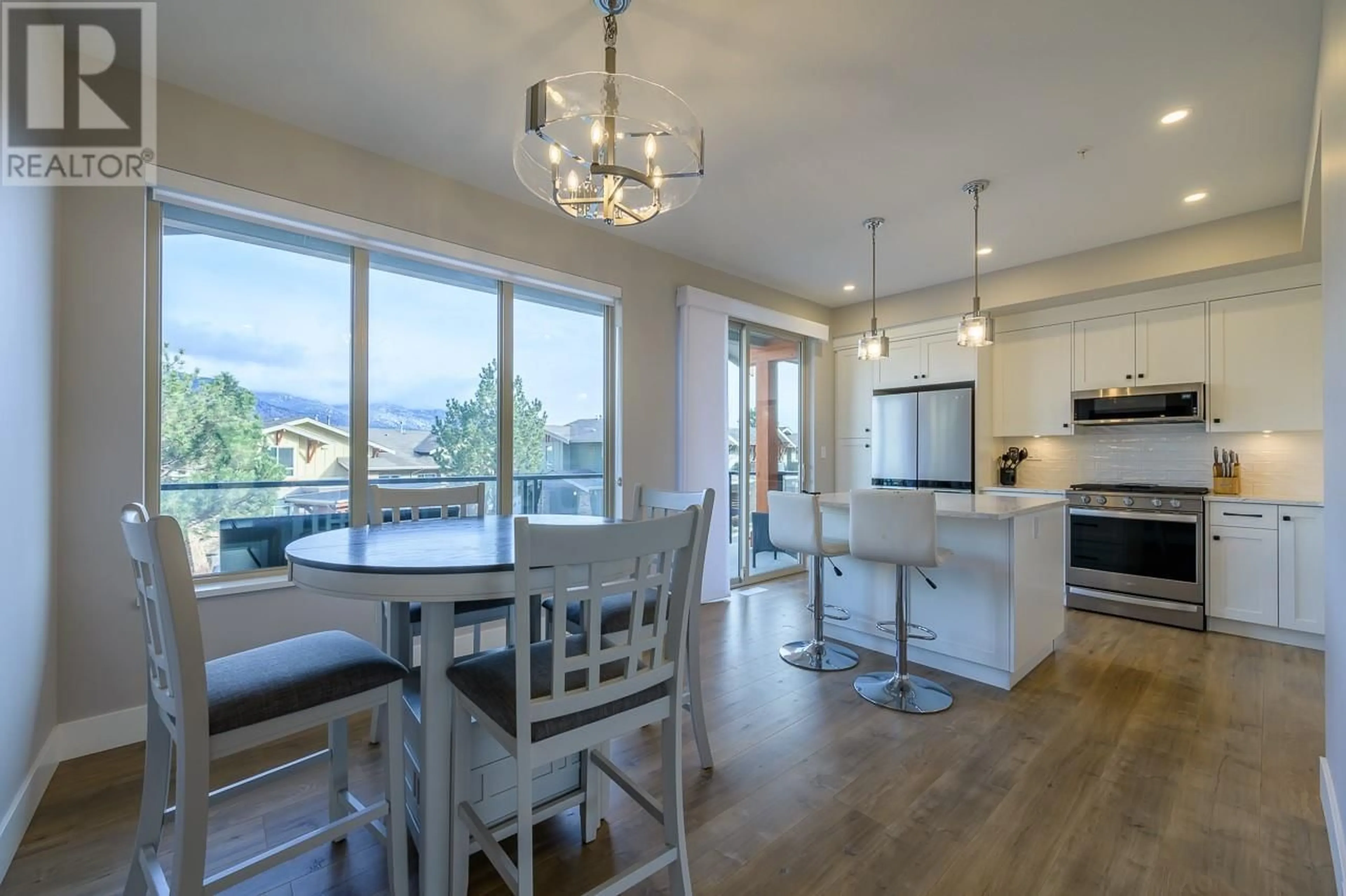 Open concept kitchen, wood/laminate floor for 43 - 130 COLEBROOK ROAD, Kamloops British Columbia V1S0B4