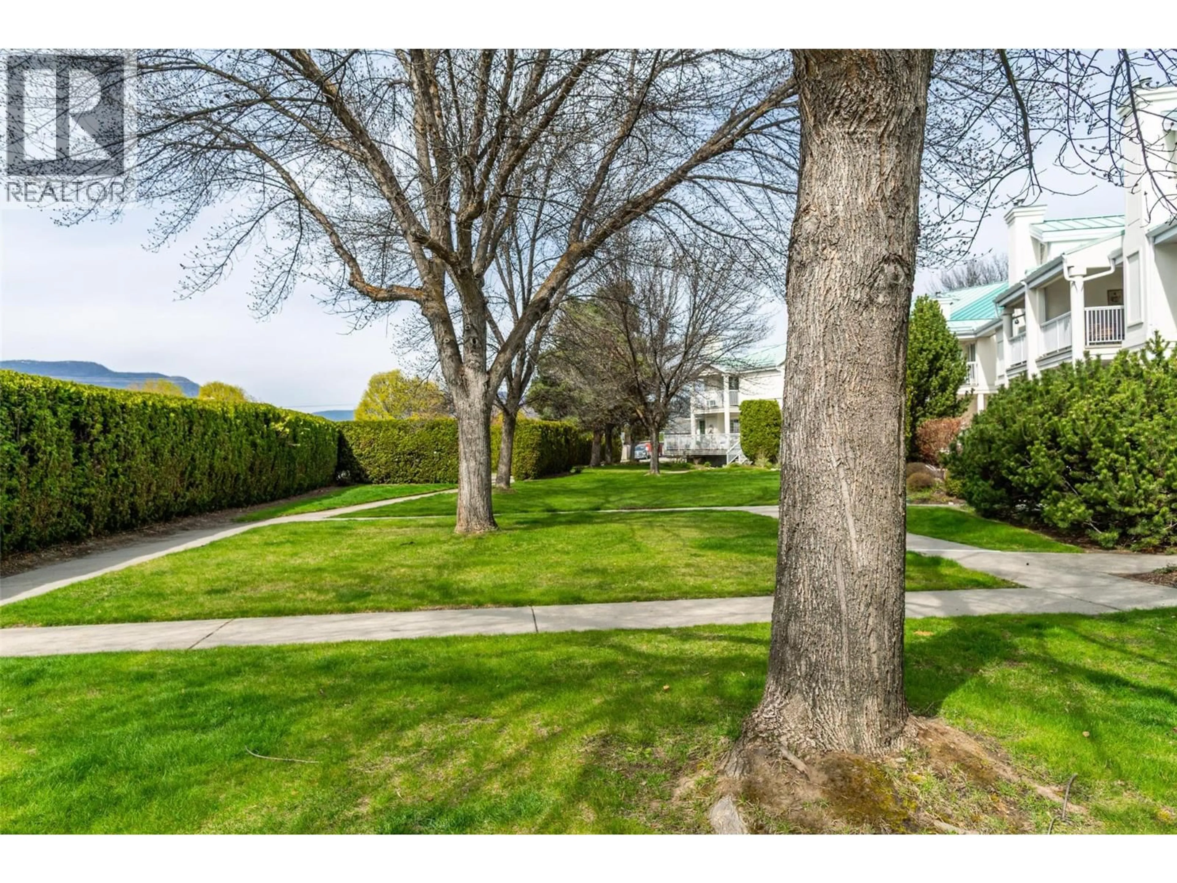 A pic from outside/outdoor area/front of a property/back of a property/a pic from drone, street for 216 - 2350 STILLINGFLEET ROAD, Kelowna British Columbia V1W3X9