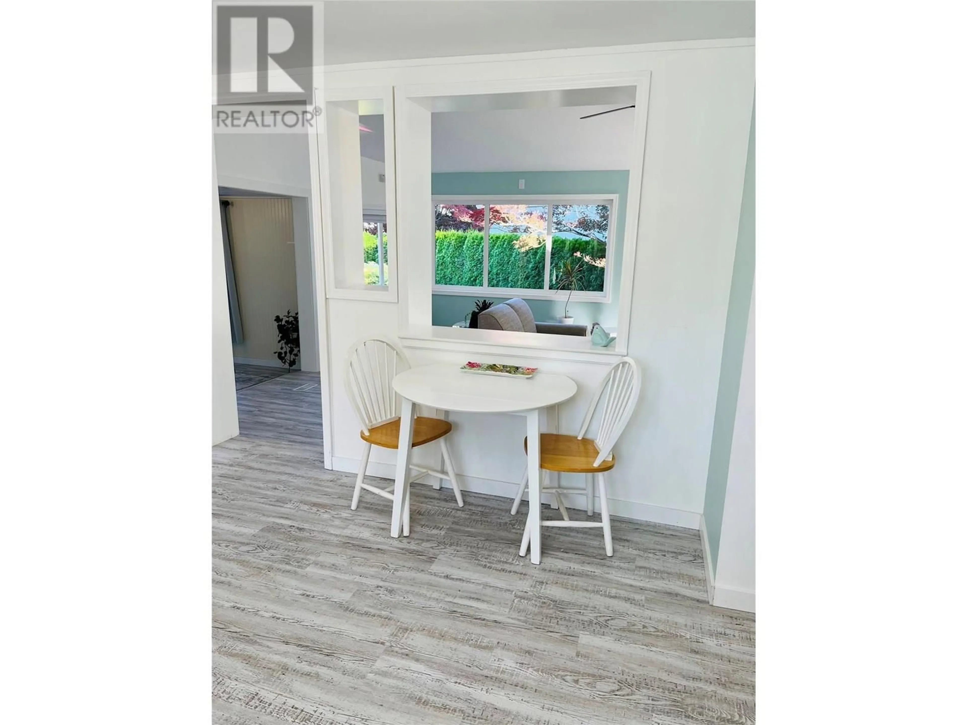 Dining room, wood/laminate floor for 6691 51 STREET NORTHEAST, Salmon Arm British Columbia V0E1K0
