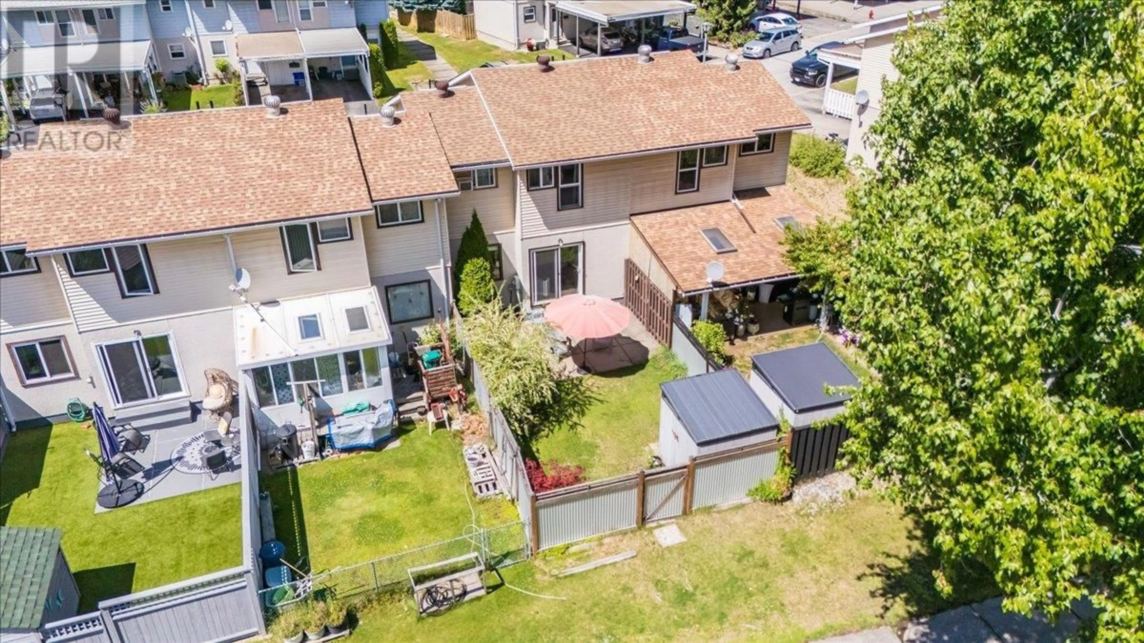 A pic from outside/outdoor area/front of a property/back of a property/a pic from drone, street for 1210 PRIMROSE STREET, Trail British Columbia V1R4M7