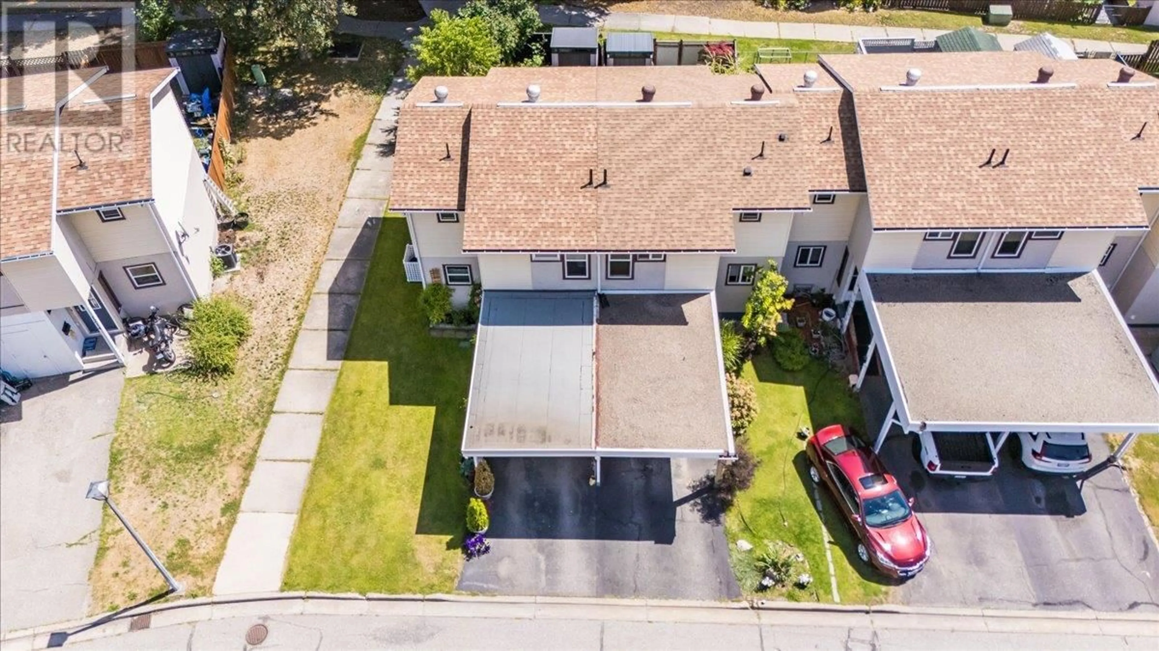 A pic from outside/outdoor area/front of a property/back of a property/a pic from drone, street for 1210 PRIMROSE STREET, Trail British Columbia V1R4M7