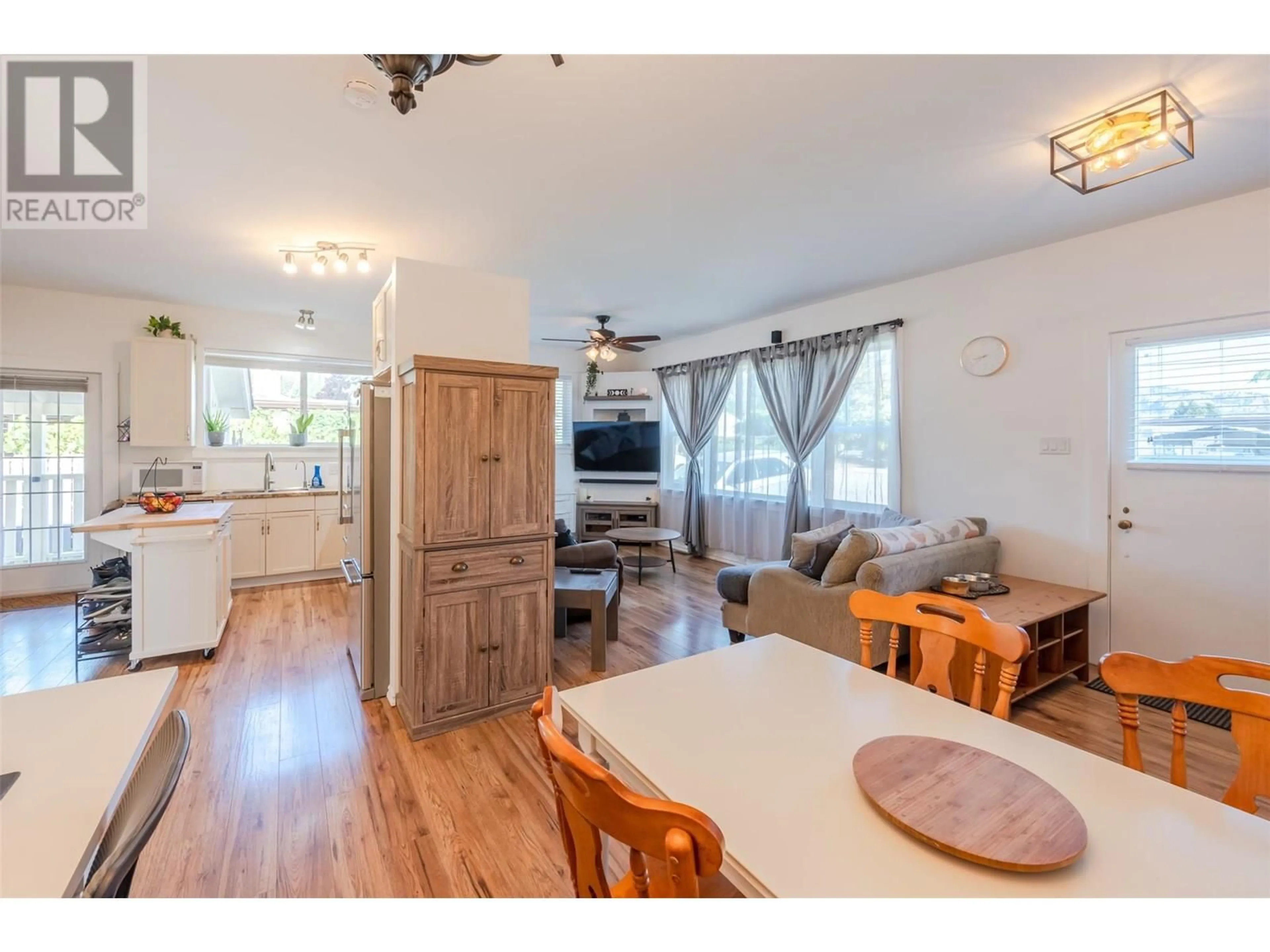 Open concept kitchen, wood/laminate floor for 11105 WARD STREET, Summerland British Columbia V0H1Z0