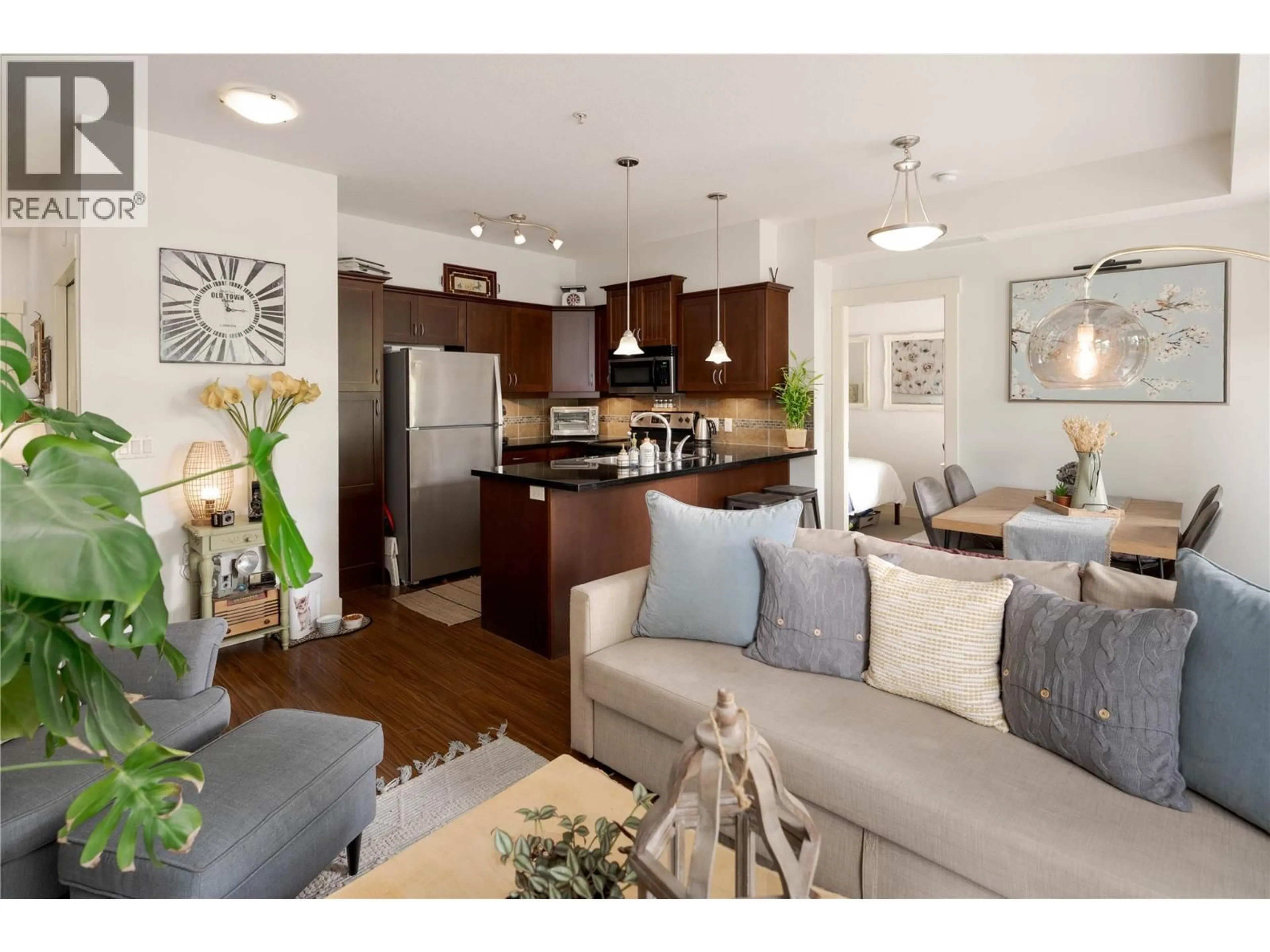 Open concept kitchen, wood/laminate floor for 205 - 3521 CARRINGTON ROAD, West Kelowna British Columbia V4T2Z8