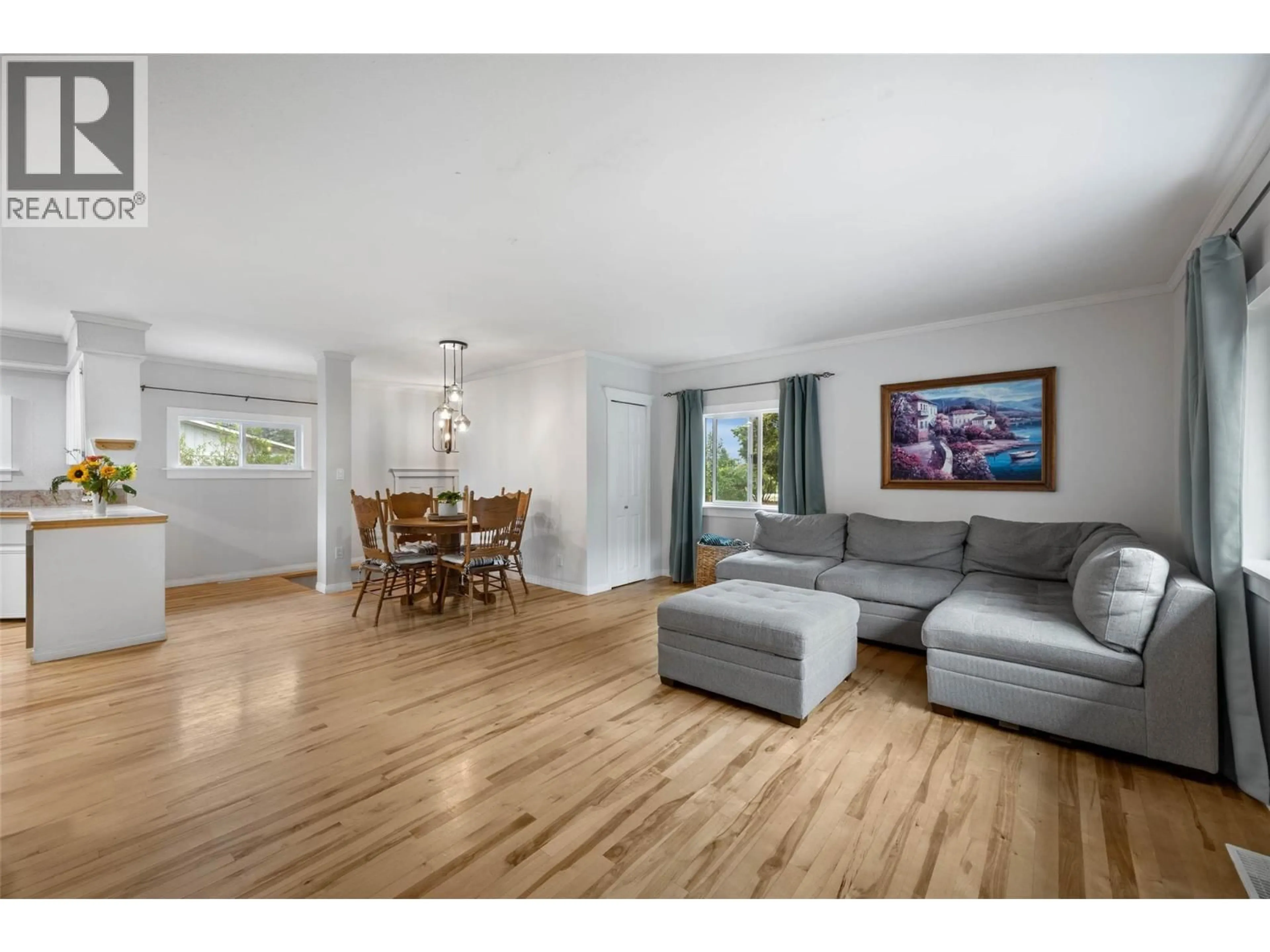 Living room with furniture, wood/laminate floor for 268 MCLURE FERRY ROAD, Kamloops British Columbia V0E2H0