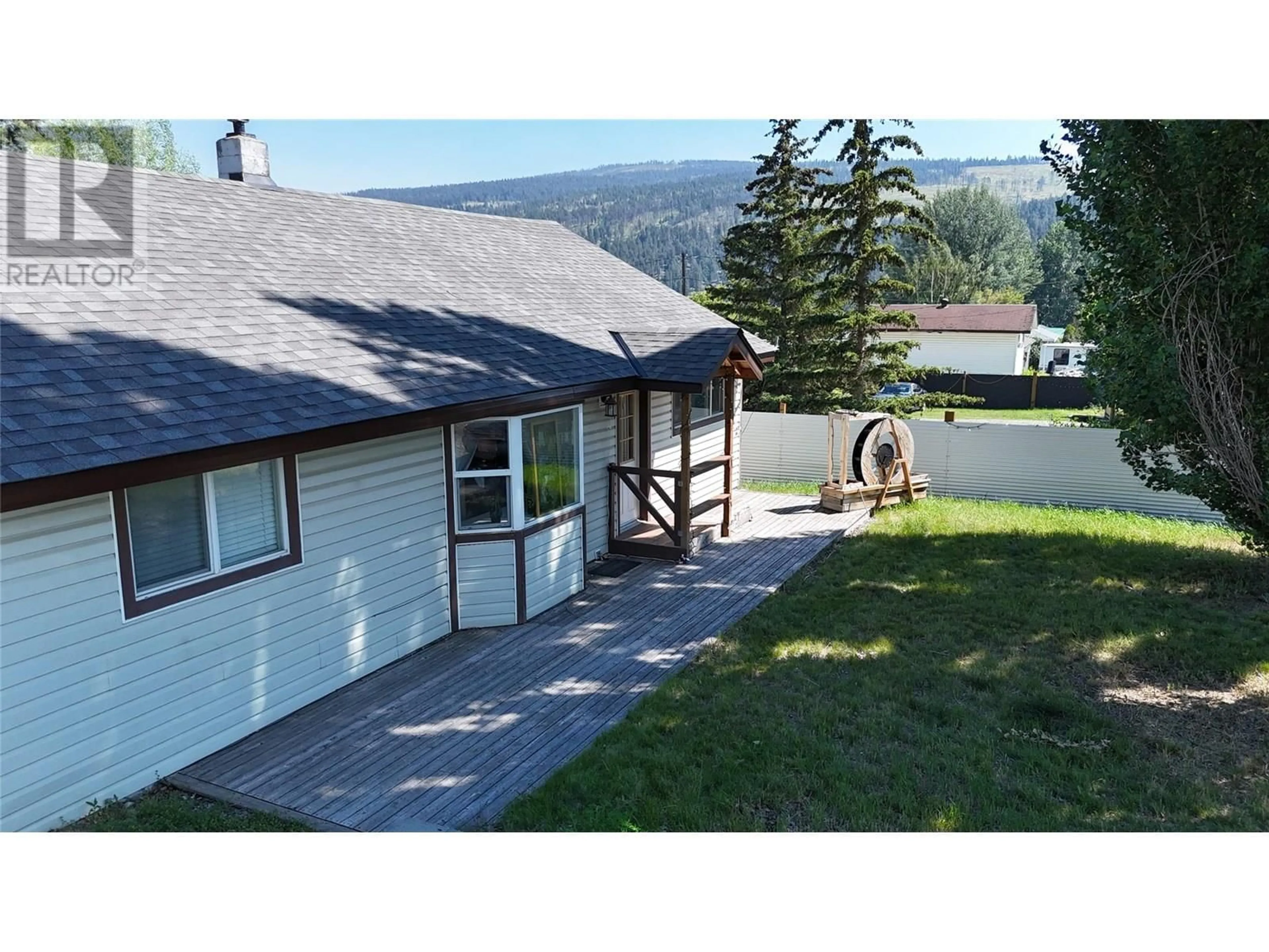 A pic from outside/outdoor area/front of a property/back of a property/a pic from drone, mountain view for 306 MCDONALD AVENUE, Clinton British Columbia V0K1K0