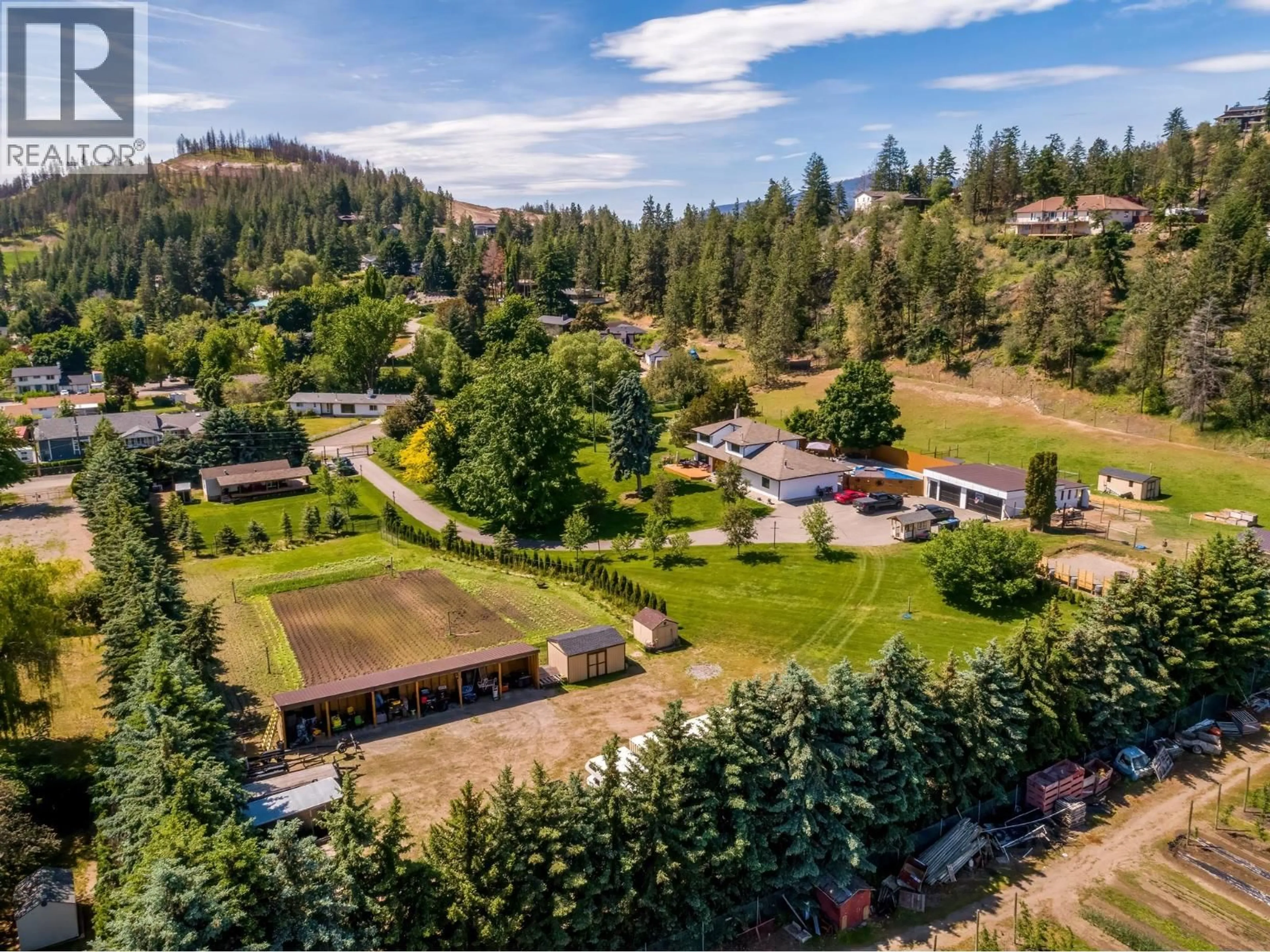 A pic from outside/outdoor area/front of a property/back of a property/a pic from drone, mountain view for 2132 MONTE CARLO ROAD, Lake Country British Columbia V4V1K6