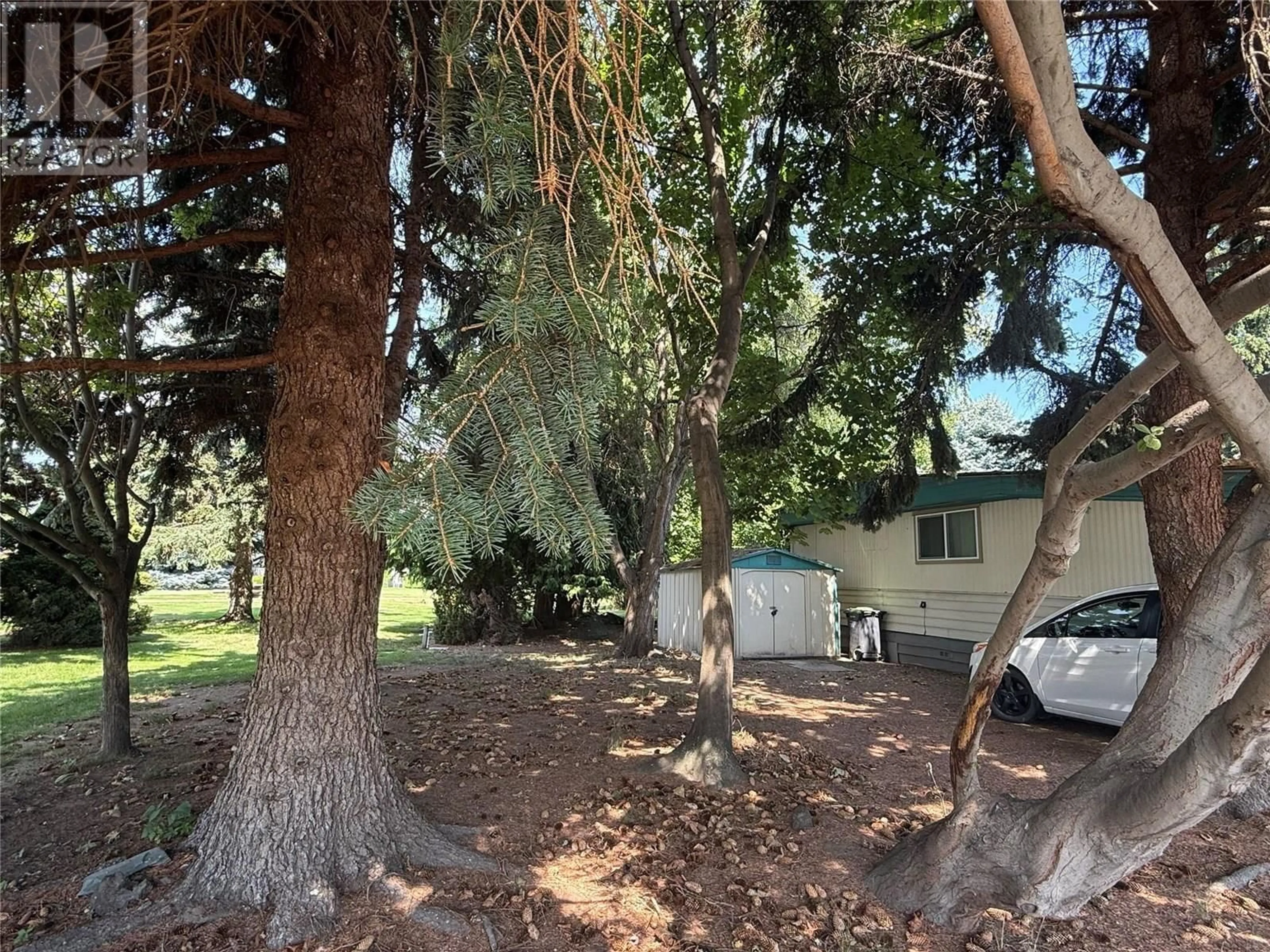 A pic from outside/outdoor area/front of a property/back of a property/a pic from drone, forest/trees view for 79 - 3535 CASORSO ROAD, Kelowna British Columbia V1W3E1