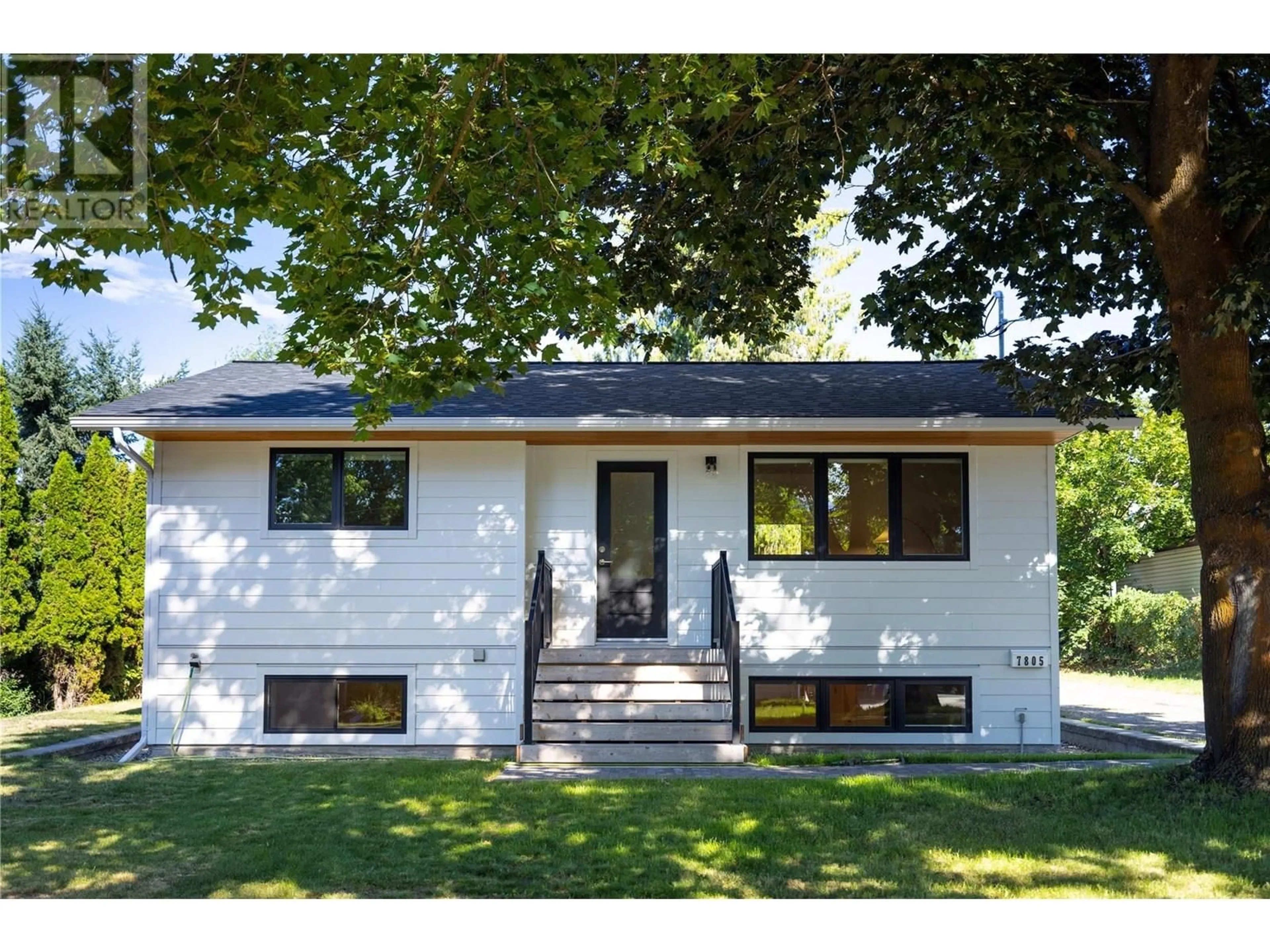 Home with vinyl exterior material, street for 7805 DE JONG DRIVE, Coldstream British Columbia V1B1P2