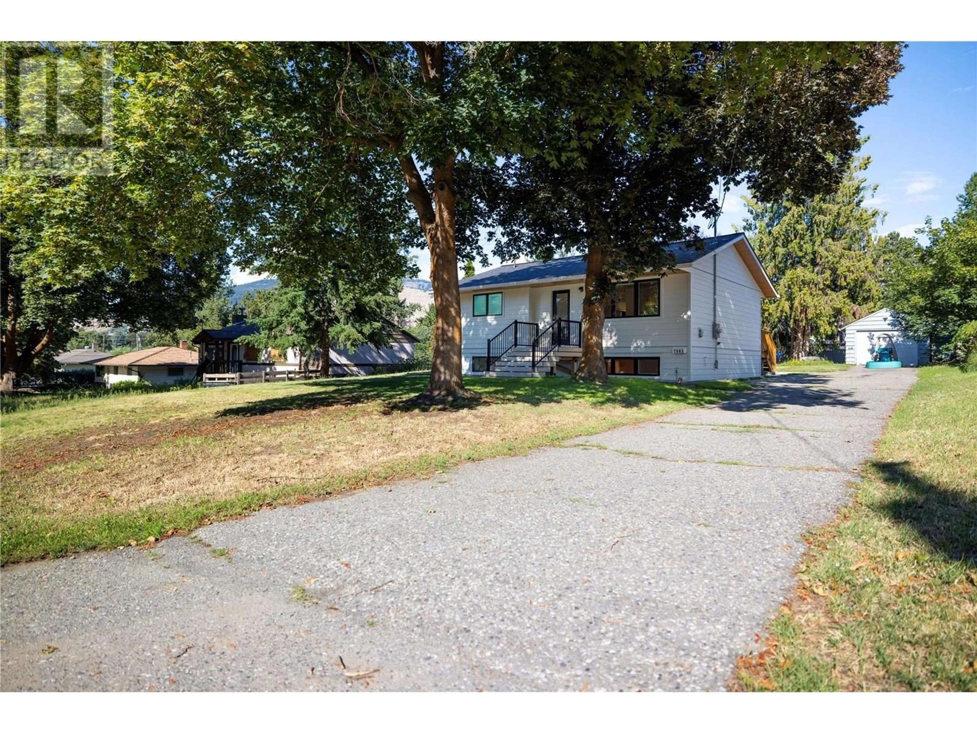 A pic from outside/outdoor area/front of a property/back of a property/a pic from drone, street for 7805 DE JONG DRIVE, Coldstream British Columbia V1B1P2