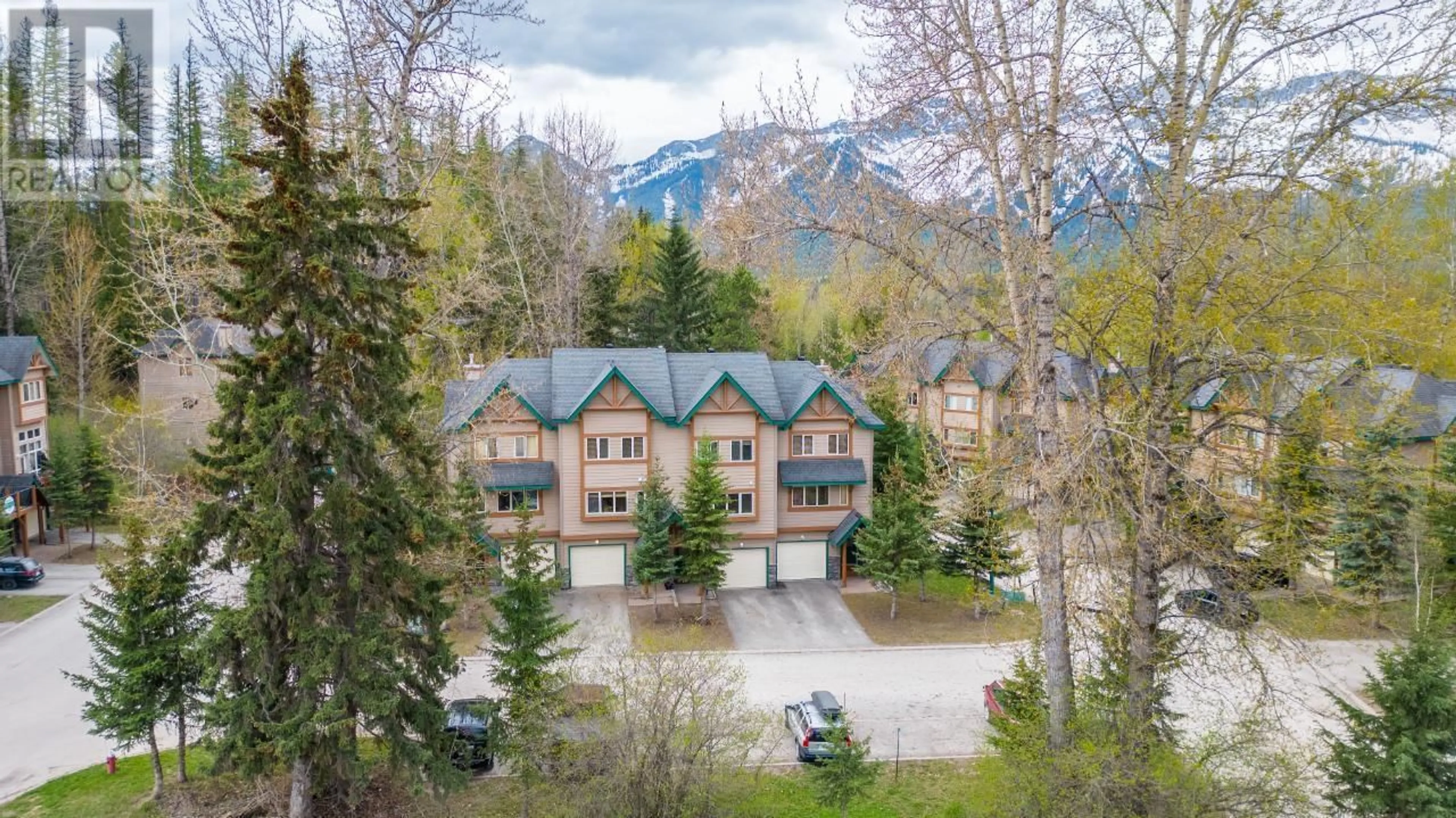 A pic from outside/outdoor area/front of a property/back of a property/a pic from drone, mountain view for B - 3 CREEK PLACE, Fernie British Columbia V0B1M4