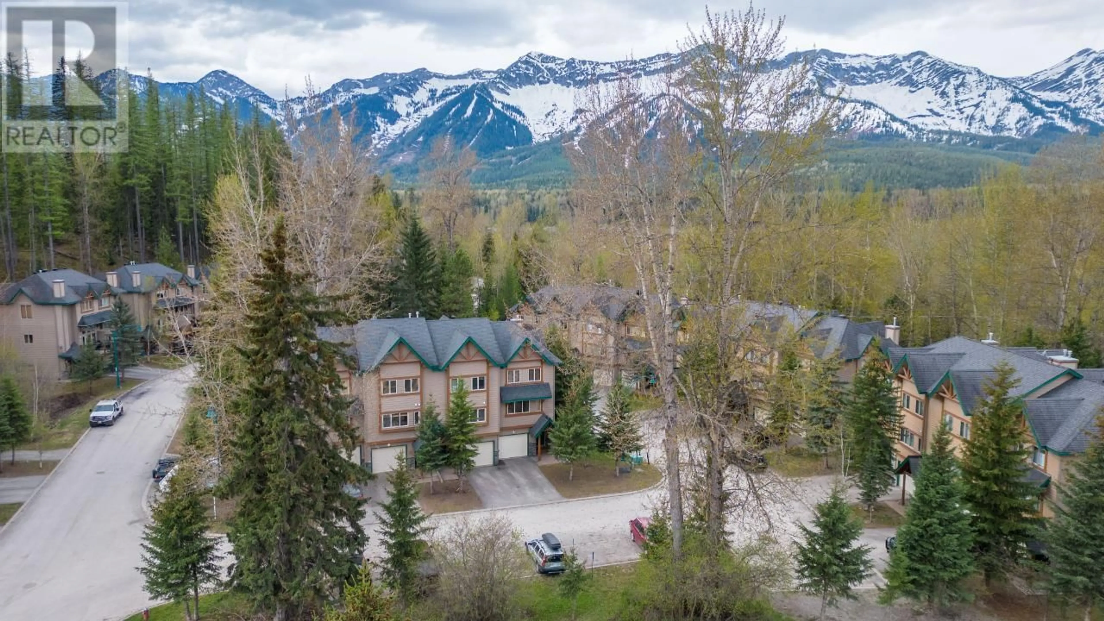 A pic from outside/outdoor area/front of a property/back of a property/a pic from drone, mountain view for B - 3 CREEK PLACE, Fernie British Columbia V0B1M4