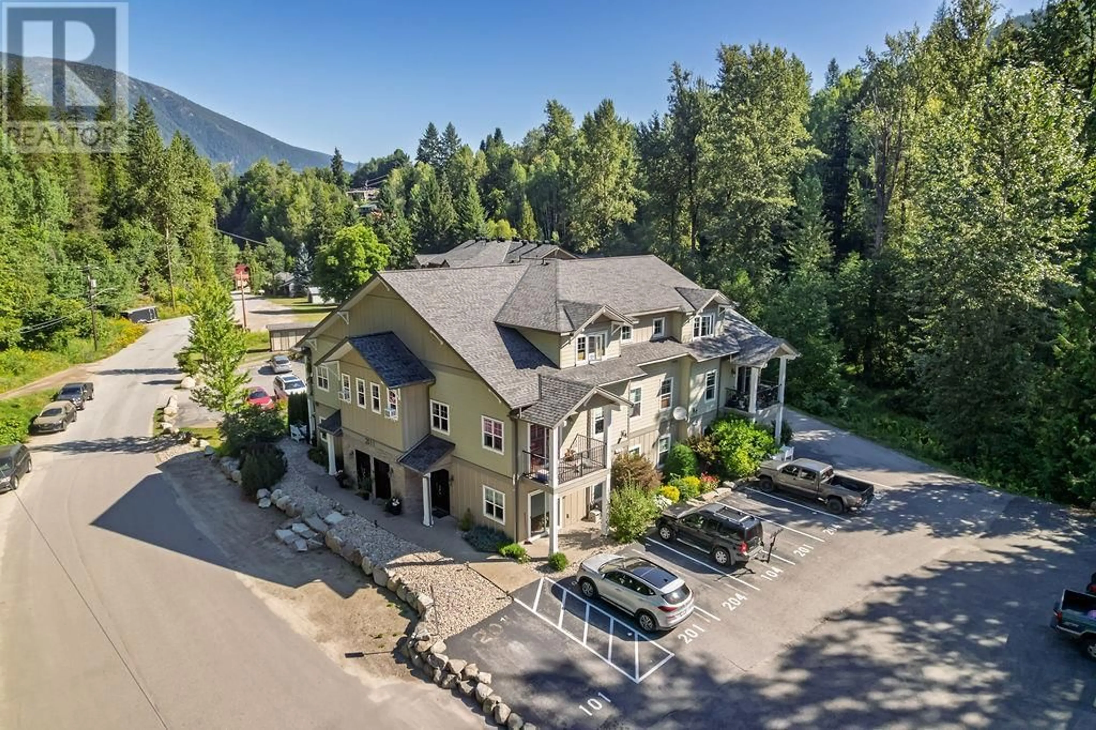 A pic from outside/outdoor area/front of a property/back of a property/a pic from drone, mountain view for 103 - 2011 PERRIER ROAD, Nelson British Columbia V1L6Y8