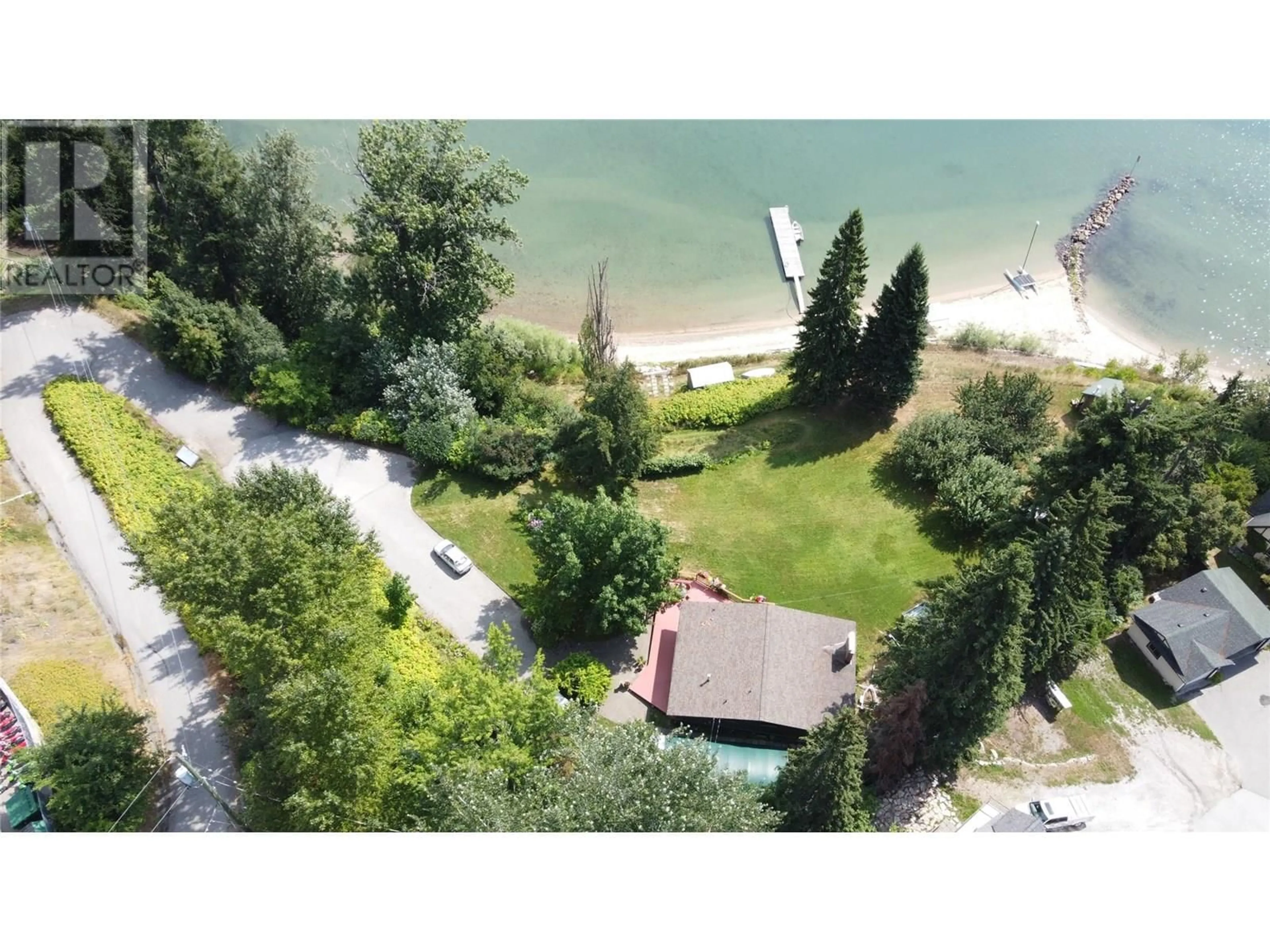 A pic from outside/outdoor area/front of a property/back of a property/a pic from drone, water/lake/river/ocean view for 706 SHUTTY ROAD, Nelson British Columbia V1L6M6