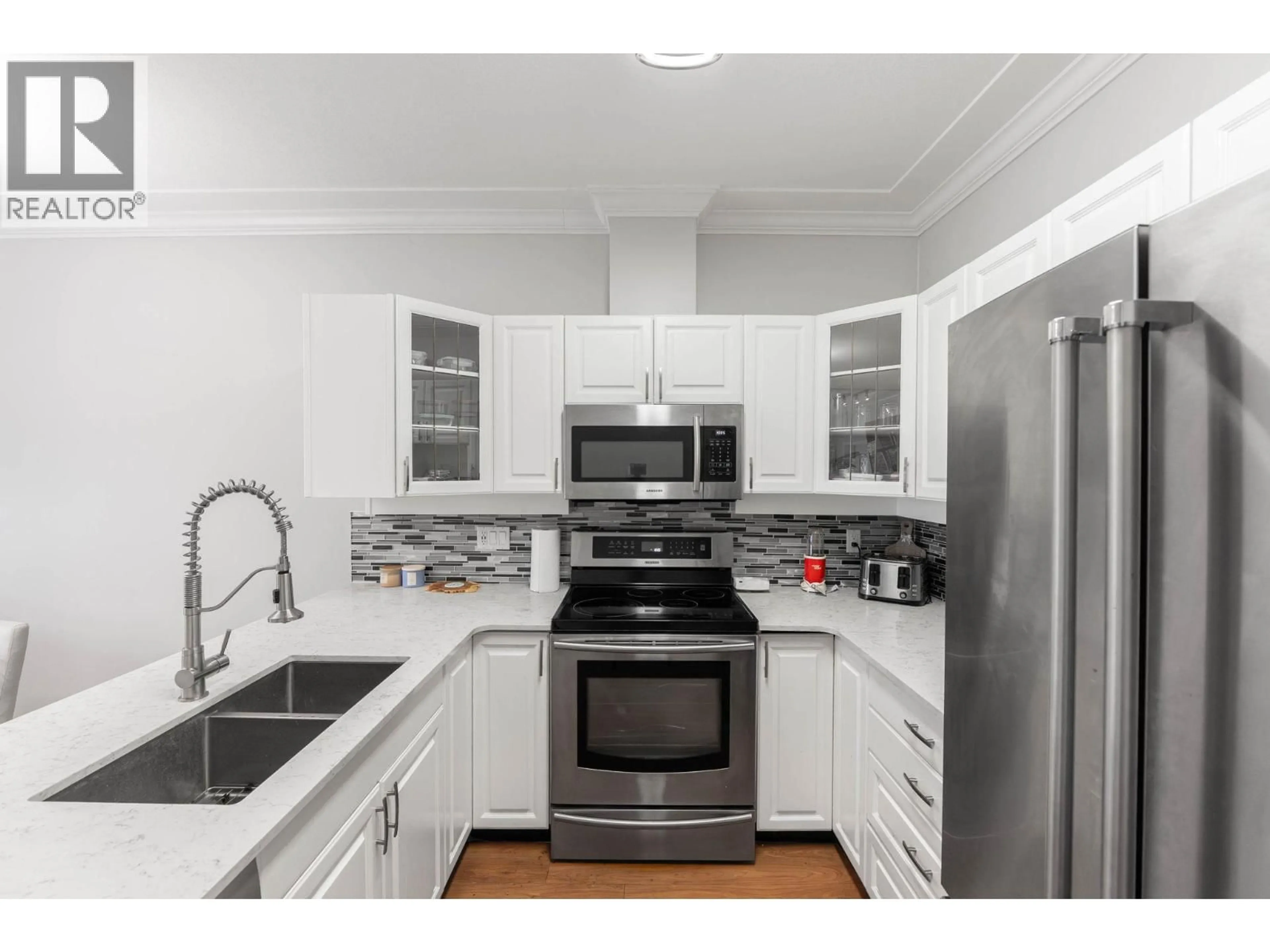 Standard kitchen, ceramic/tile floor for 201 - 1152 LANFRANCO ROAD, Kelowna British Columbia V1W3W5