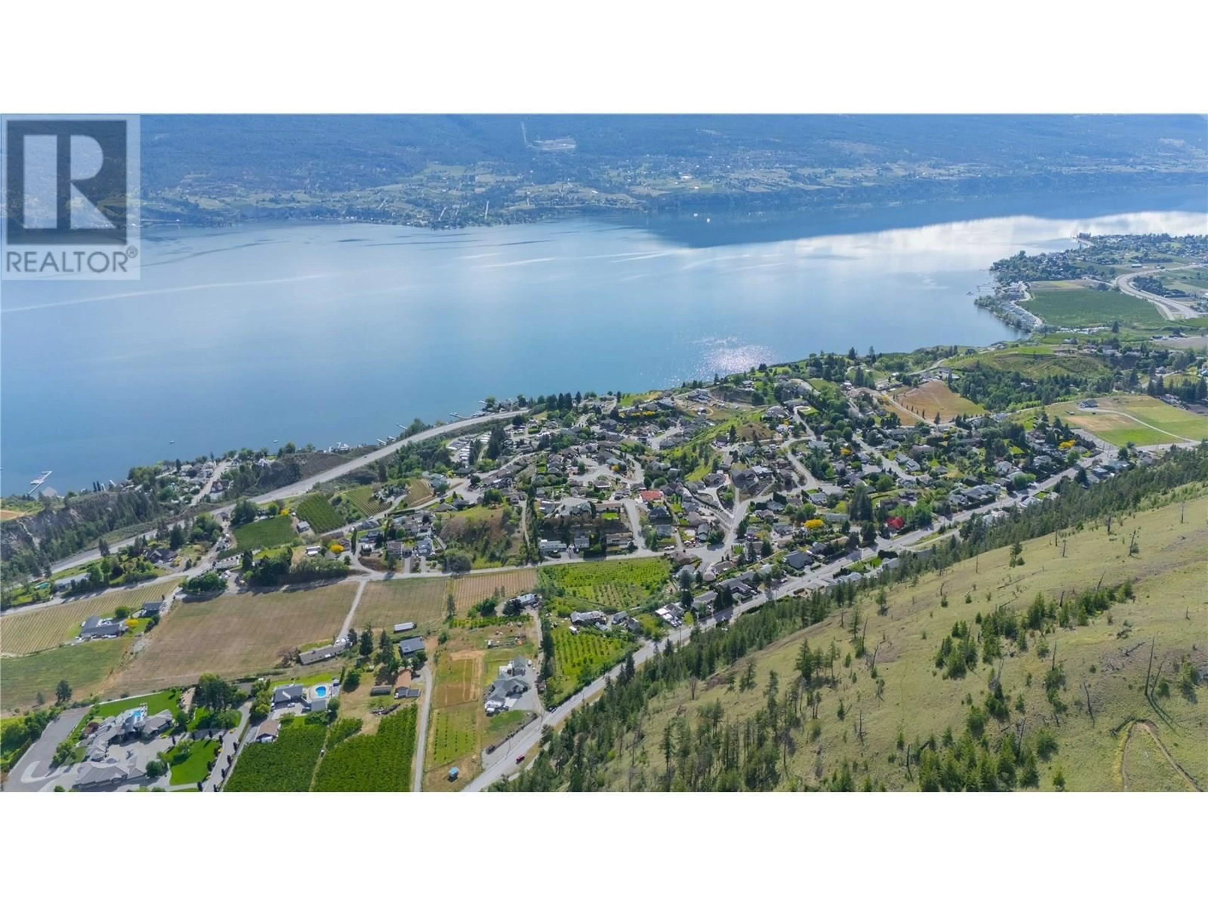 A pic from outside/outdoor area/front of a property/back of a property/a pic from drone, water/lake/river/ocean view for 11209 GIANTS HEAD ROAD, Summerland British Columbia V0H1Z3
