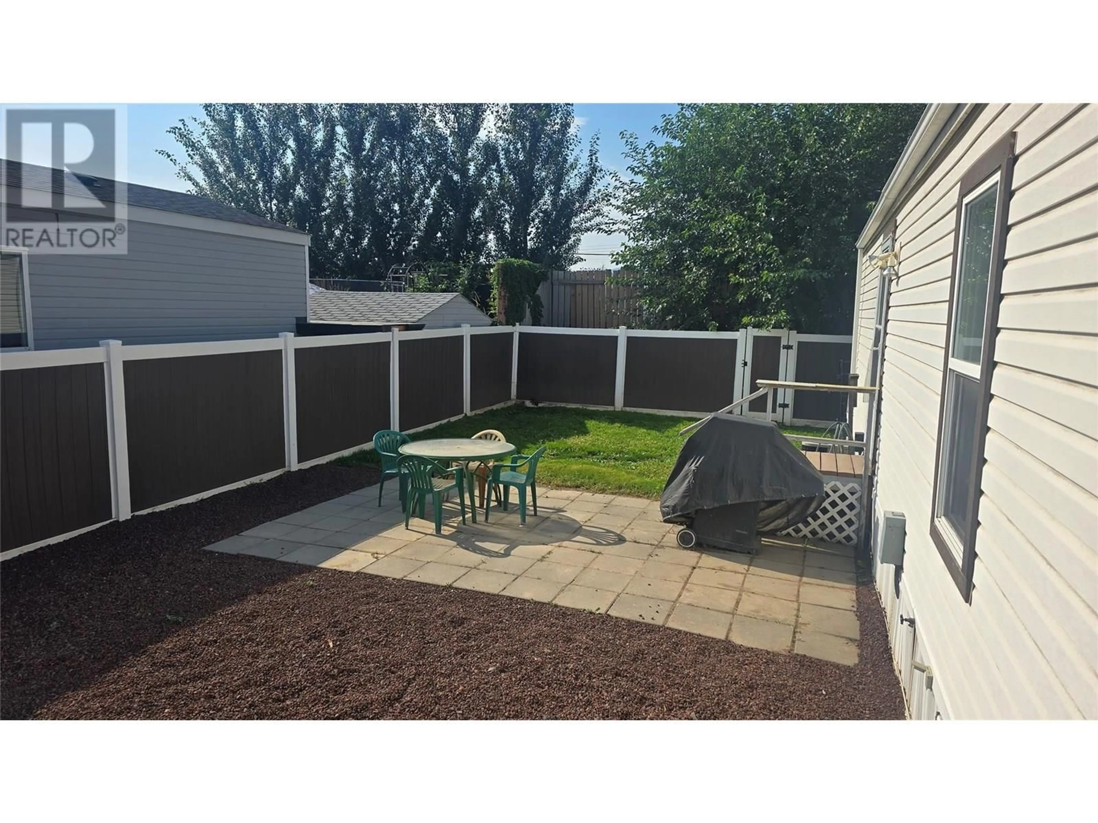 A pic from outside/outdoor area/front of a property/back of a property/a pic from drone, street for 22 - 1525 ORD ROAD, Kamloops British Columbia V2B7V2
