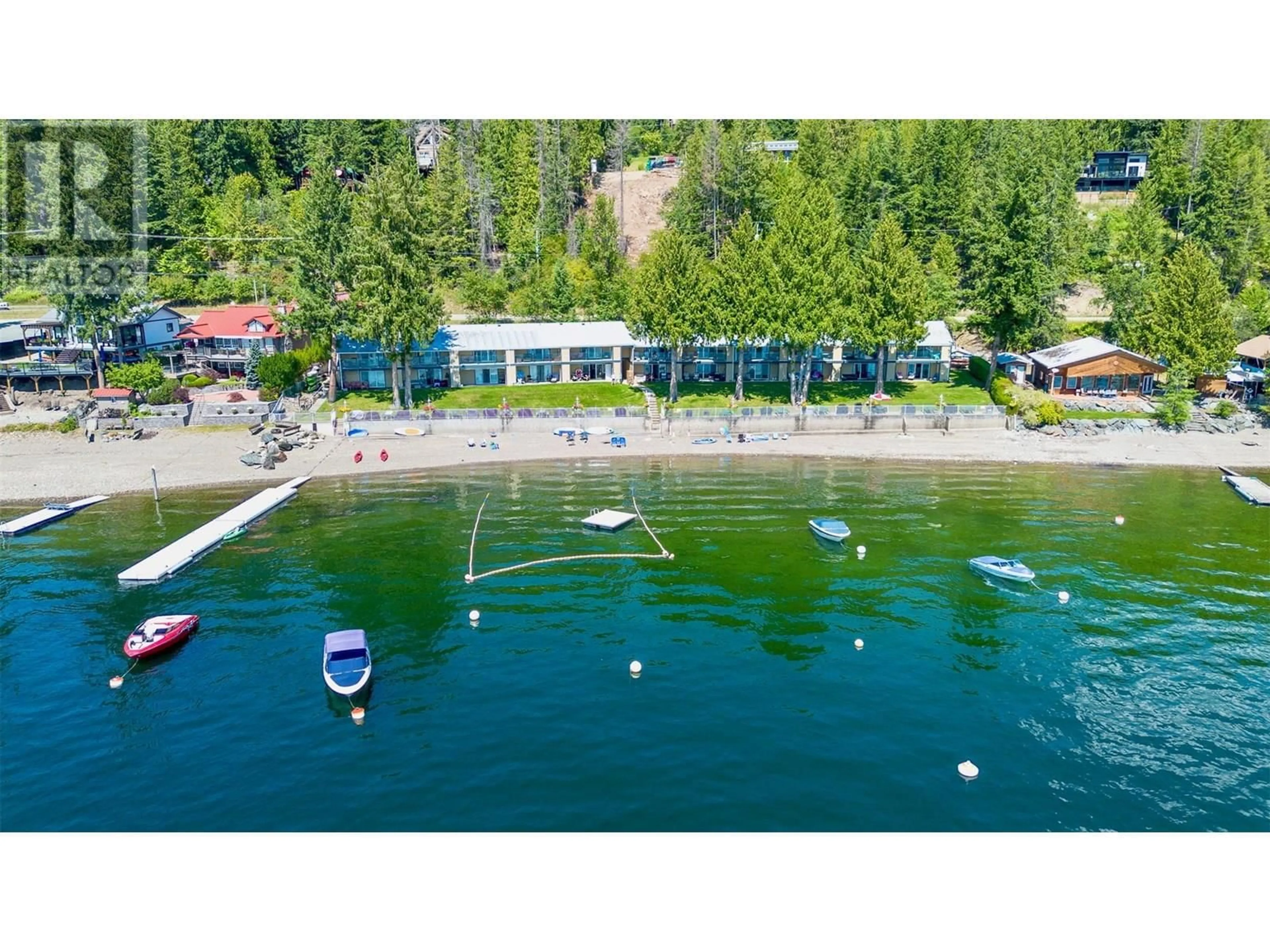 A pic from outside/outdoor area/front of a property/back of a property/a pic from drone, water/lake/river/ocean view for 16 - 7732 SQUILAX-ANGLEMONT ROAD, Anglemont British Columbia V0E1M8