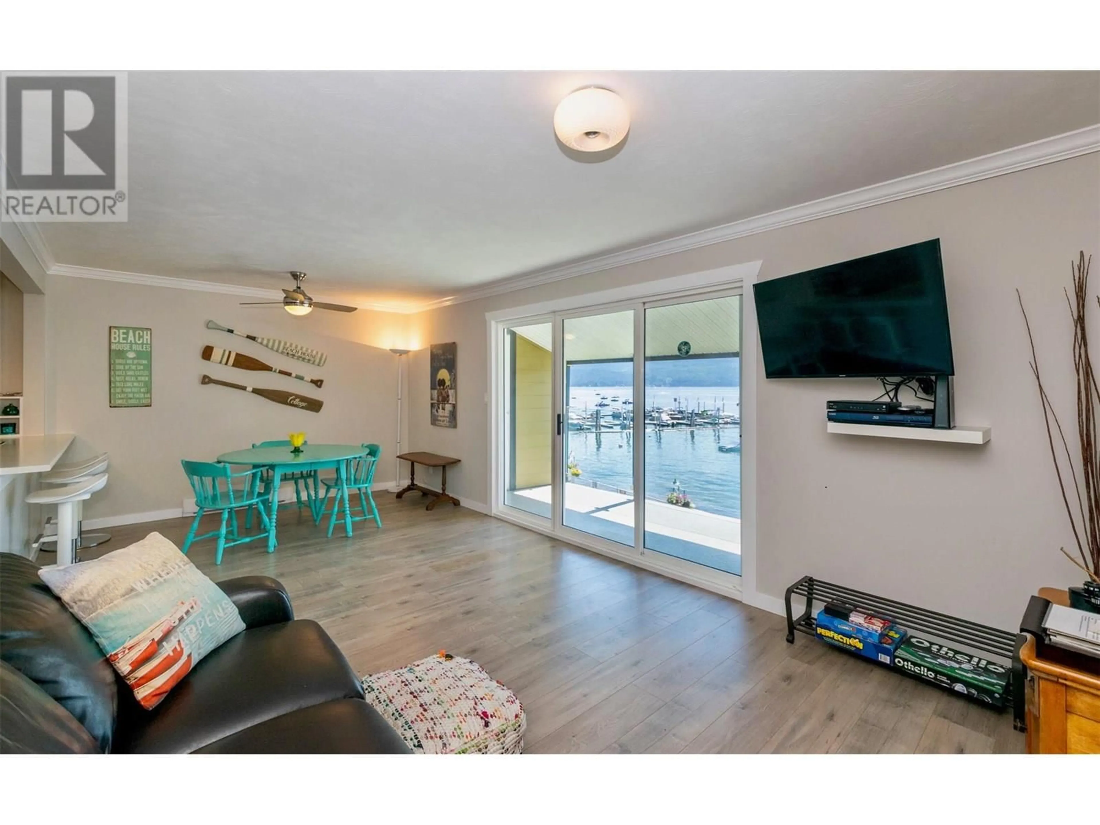 Living room with furniture, wood/laminate floor for 16 - 7732 SQUILAX-ANGLEMONT ROAD, Anglemont British Columbia V0E1M8