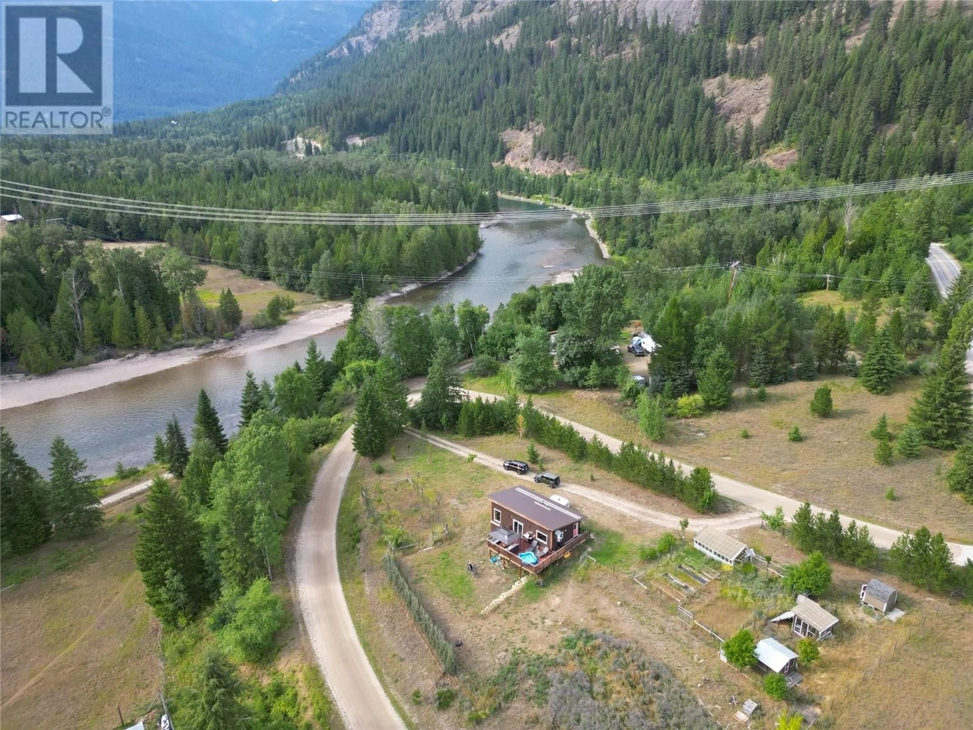 A pic from outside/outdoor area/front of a property/back of a property/a pic from drone, mountain view for 3364 KOCH SIDING ROAD, Slocan Park British Columbia V0G2E0