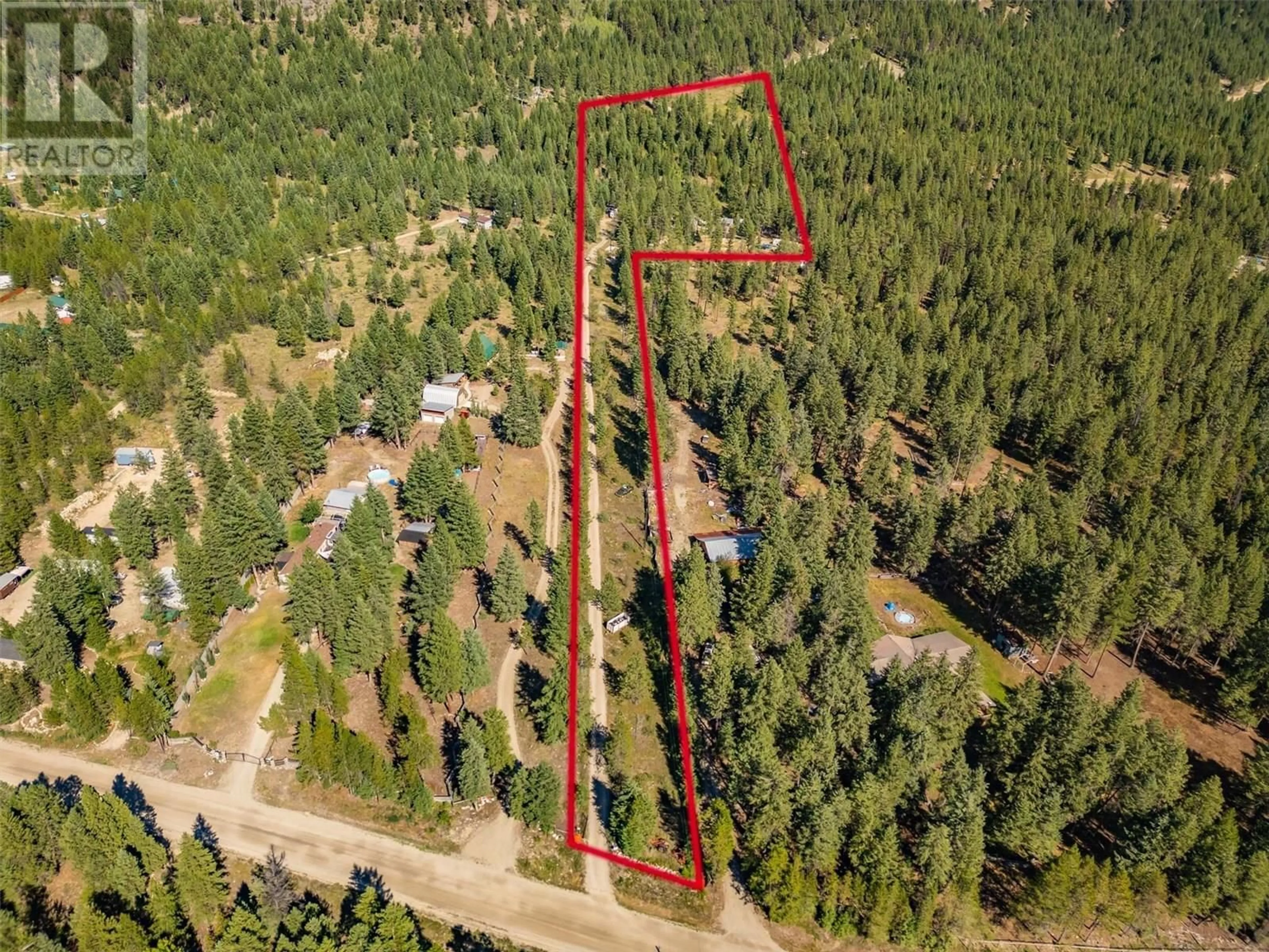 A pic from outside/outdoor area/front of a property/back of a property/a pic from drone, forest/trees view for 60 SMOKER ROAD, Carmi British Columbia V0H1A0