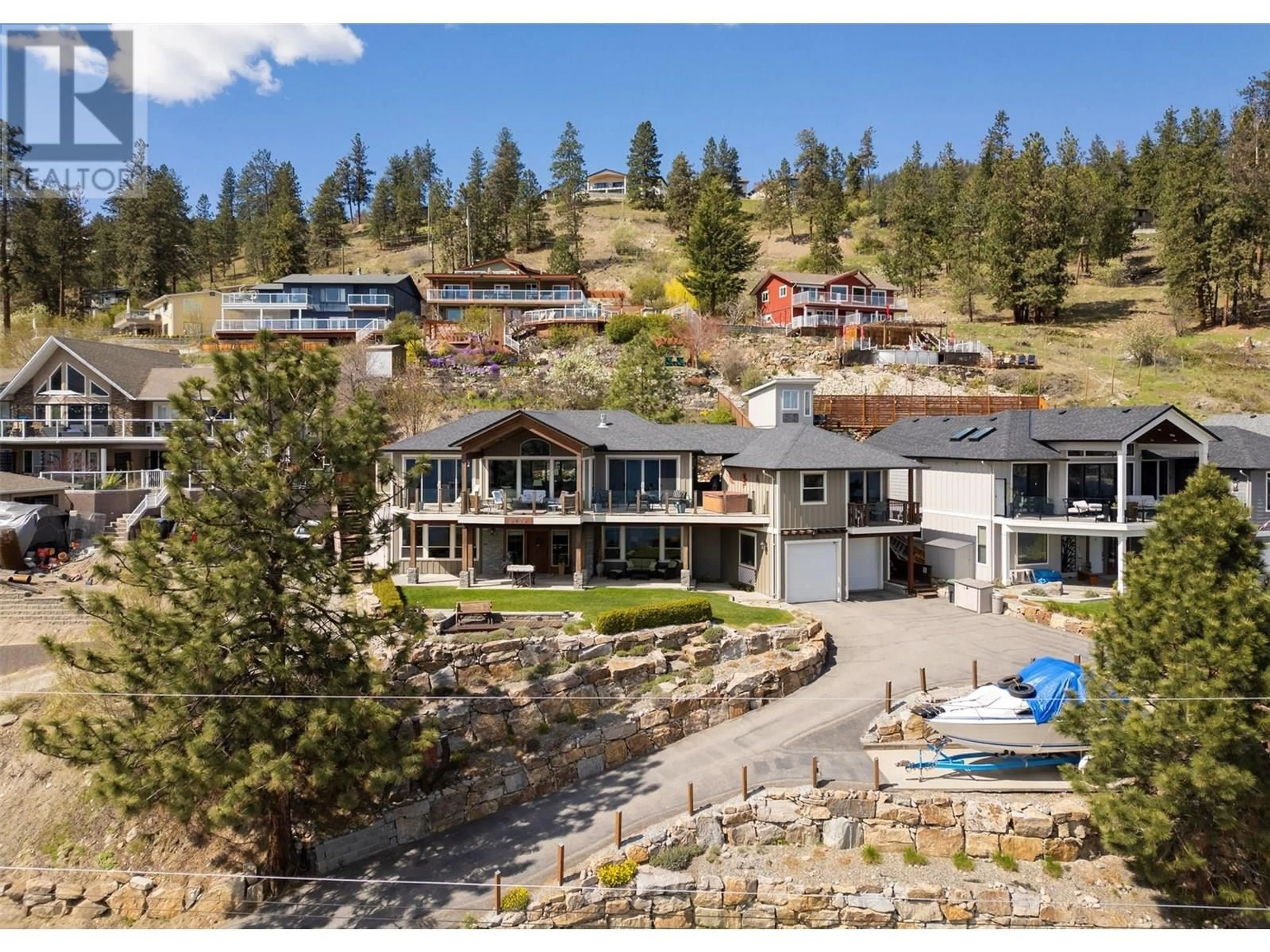 A pic from outside/outdoor area/front of a property/back of a property/a pic from drone, mountain view for 5824 COLUMBIA AVENUE, Peachland British Columbia V0H1X4