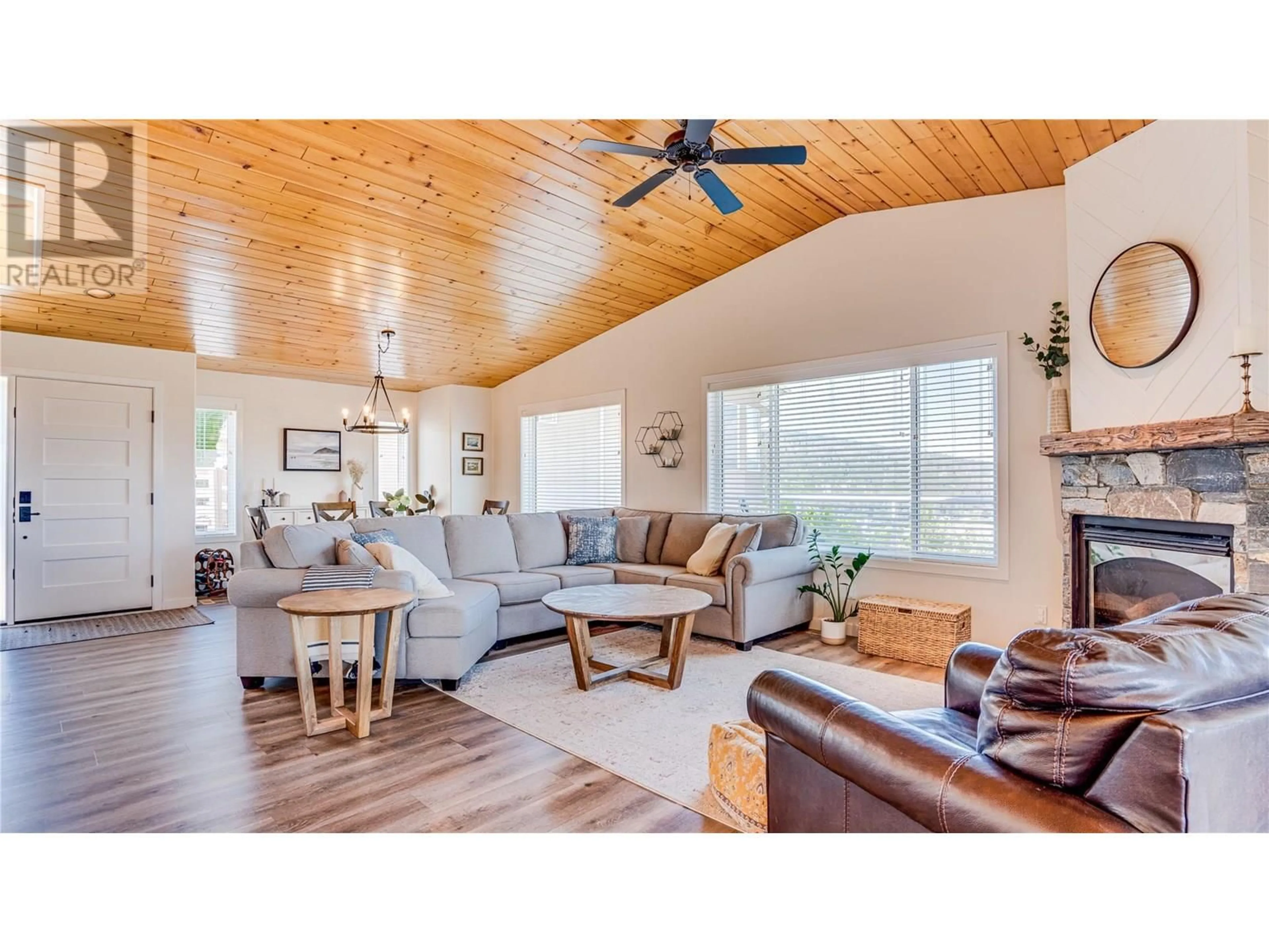 Living room with furniture, wood/laminate floor for 111 REVEL CRESCENT, Enderby British Columbia V4Y4B8