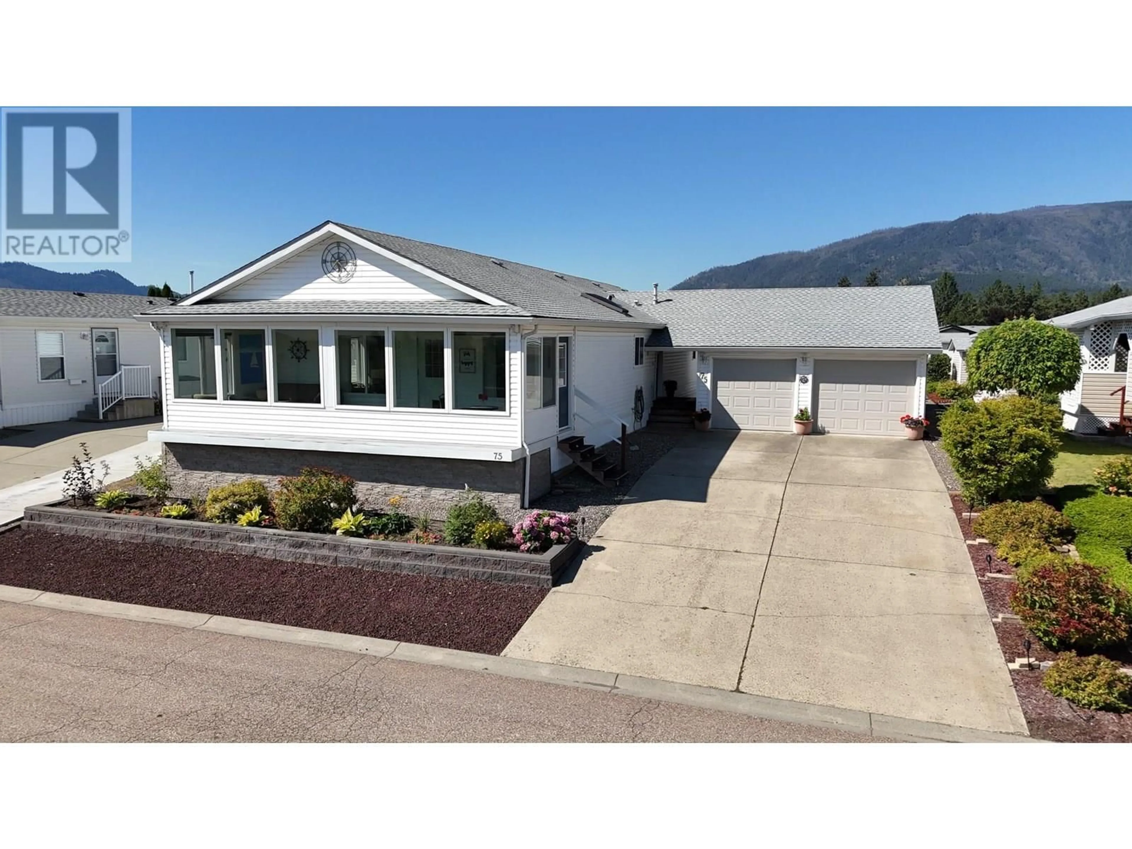 Home with vinyl exterior material, mountain view for 75 - 9510 HIGHWAY 97 OTHER NORTH, Vernon British Columbia V1H1R8