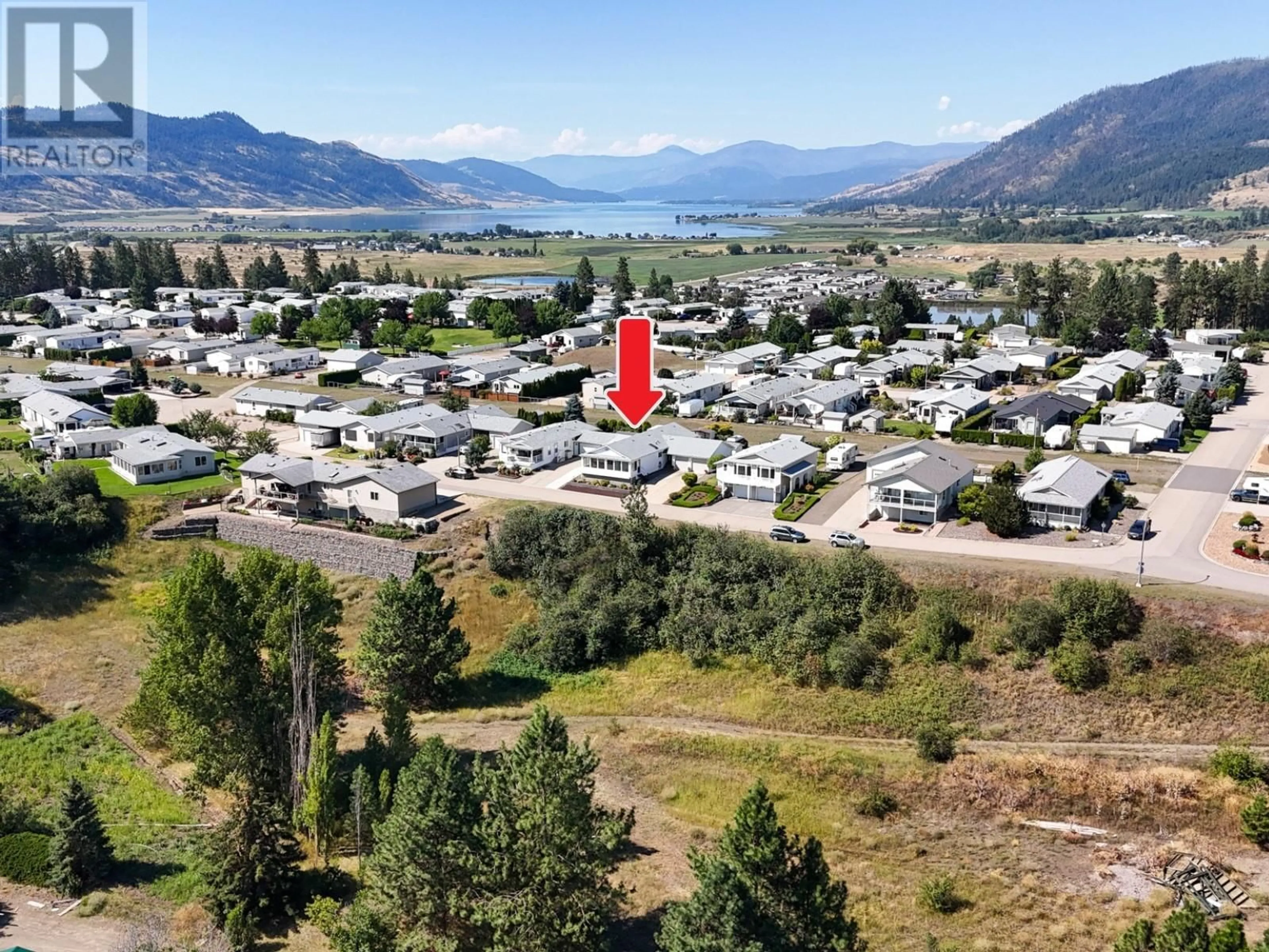 A pic from outside/outdoor area/front of a property/back of a property/a pic from drone, mountain view for 75 - 9510 HIGHWAY 97 OTHER NORTH, Vernon British Columbia V1H1R8